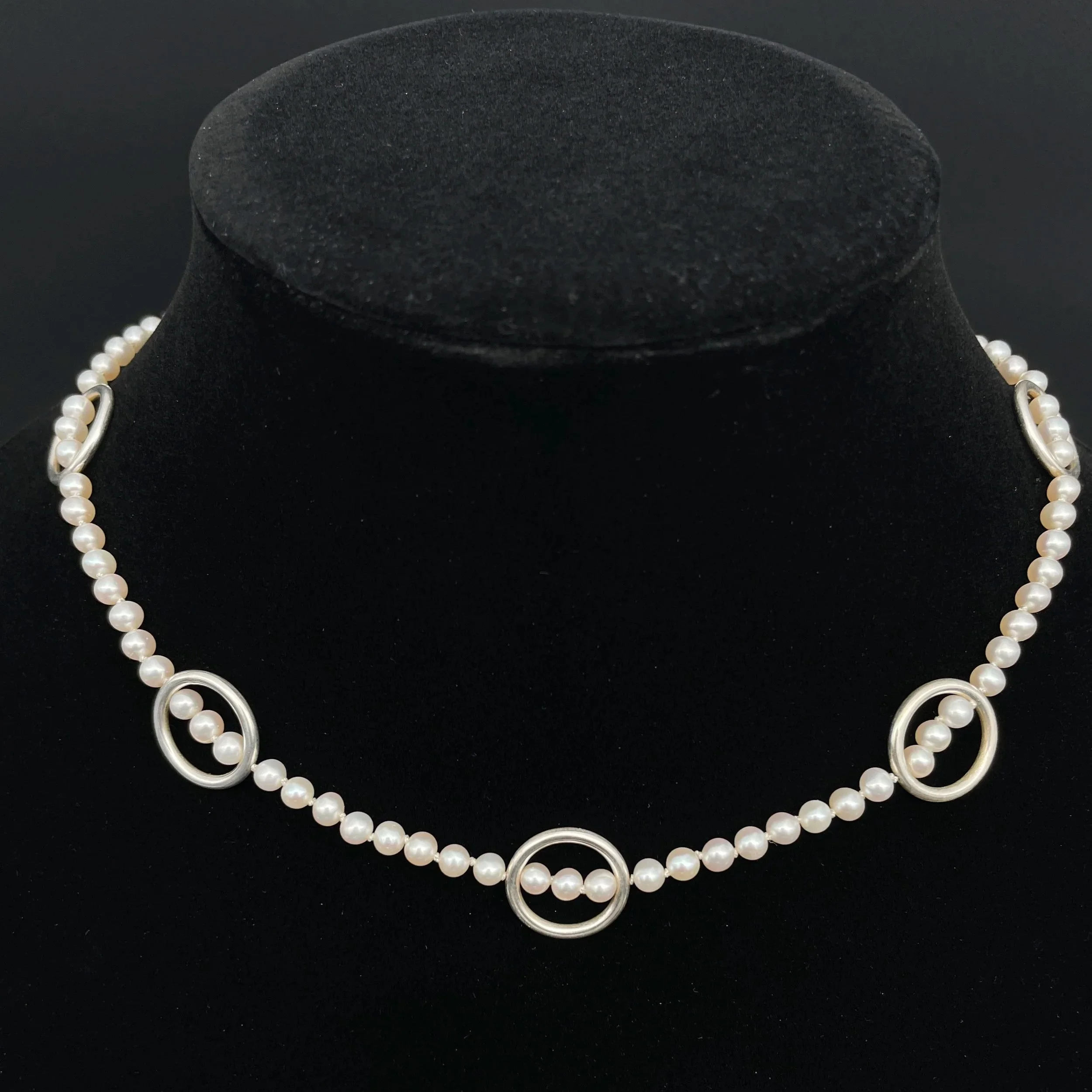 PearlRingNecklace_onbustBlack.jpg