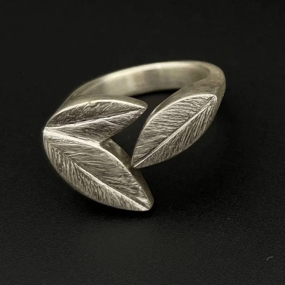 LeafSignet3Rings_onblack.jpg