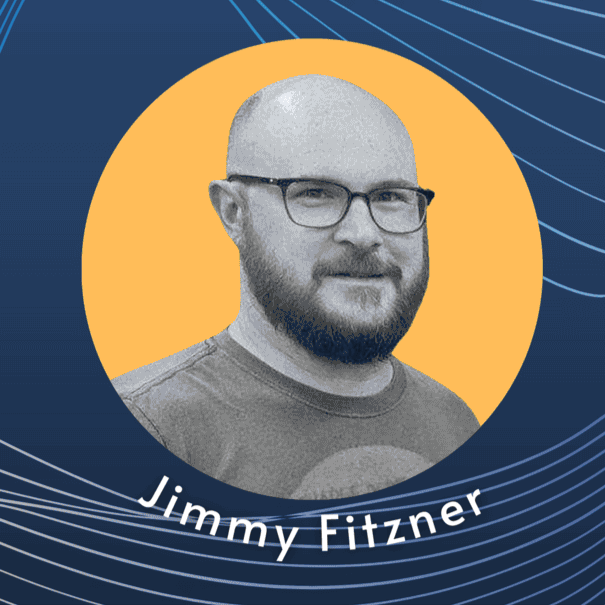 Headshot of Jimmy Fitzner with glasses and beard, set against a blue and yellow circular background with white wavy lines.