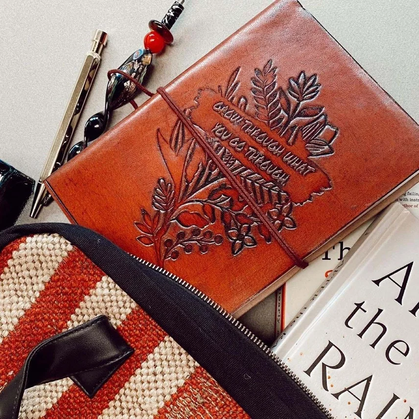 GROW THROUGH WHAT YOU GO THROUGH - leather journal 3.webp