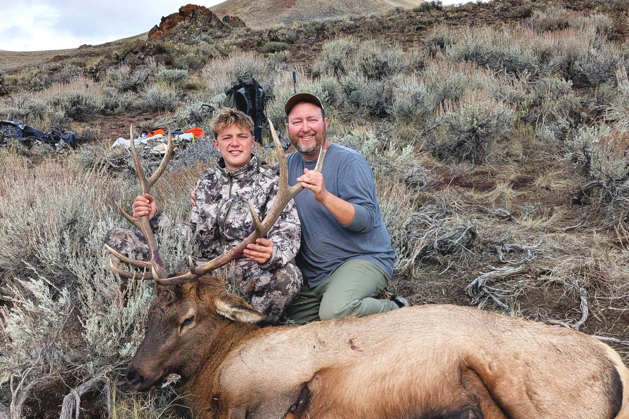 Flint with  5x6 bull elk harvested in rifle season