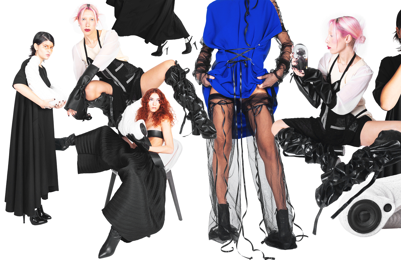 Group of four women in avant-garde fashion posing with bold outfits and accessories against a white background.