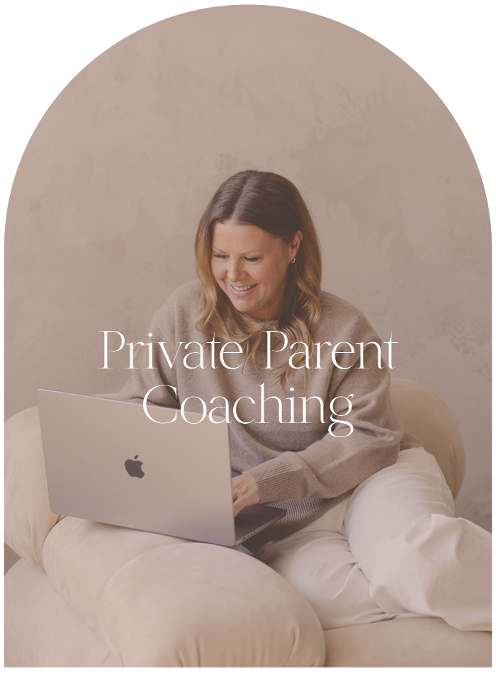 A woman sitting on a beige cushion using a silver MacBook laptop, smiling, with text overlay reading 'Private Parent Coaching'.