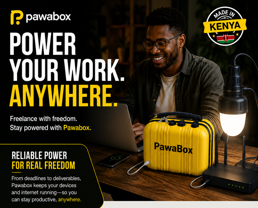 A man sitting at a desk with a yellow portable power bank labeled PawaBox, a laptop, a smartphone, and a lamp, promoting PawaBox portable power for remote work in Kenya.