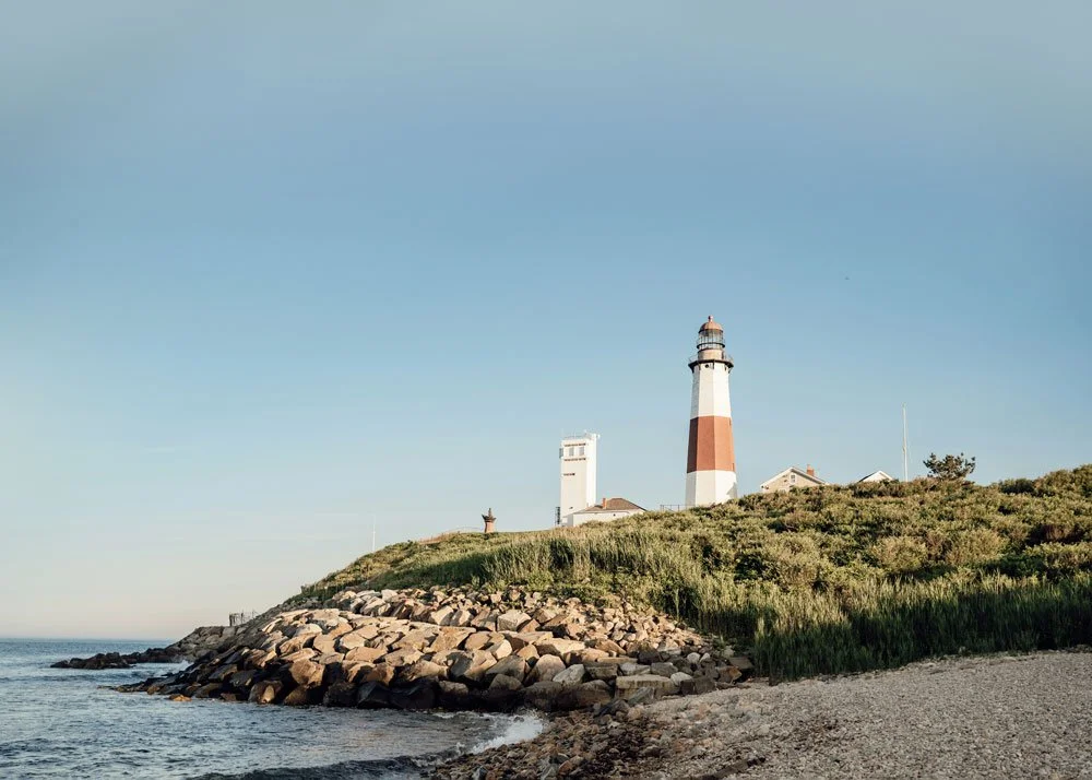 Historic lighthouse along the East Coast shoreline overlooking the ocean