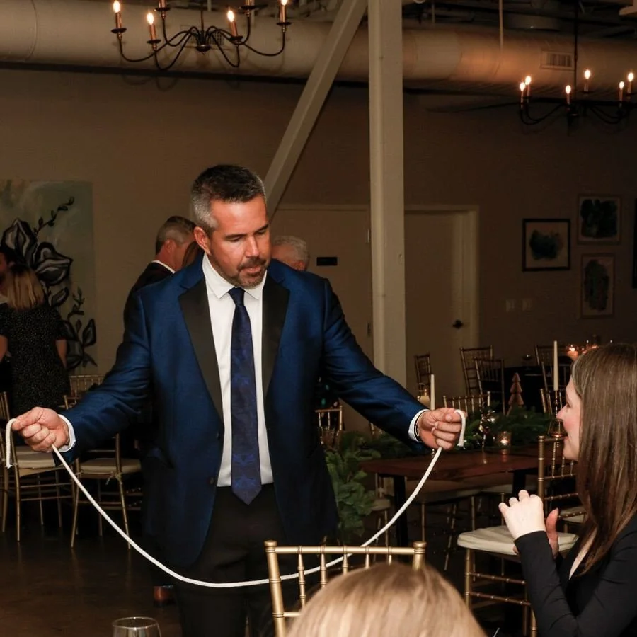 Strolling magic  by performer, magician and entertainer Dustin Adcock, perfect for  cocktail hours, networking events, and pre-event gatherings.