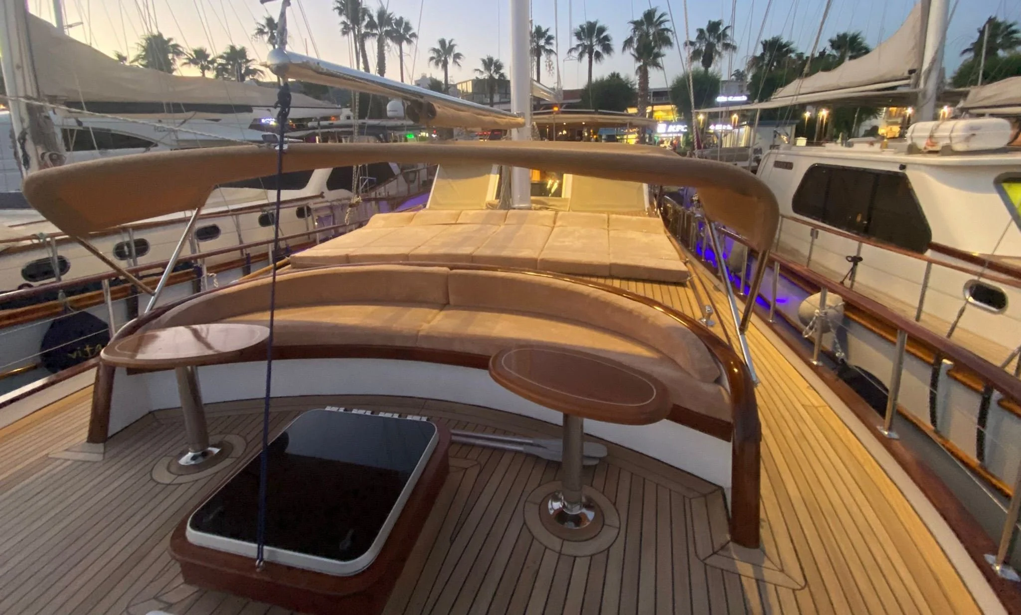 Private gulet deck seating area at the marina