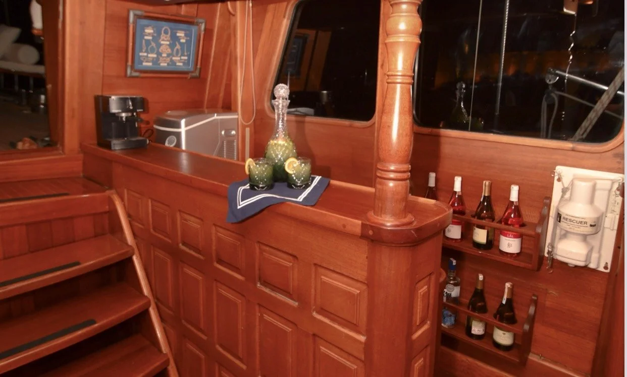 Wooden bar area inside a private gulet.