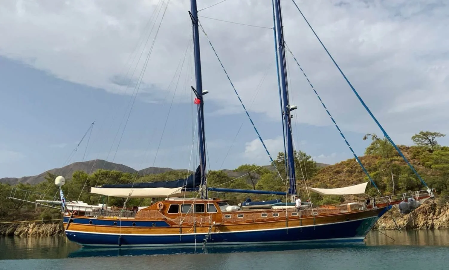 Traditional wooden gulet docked on calm water near Bodrum.