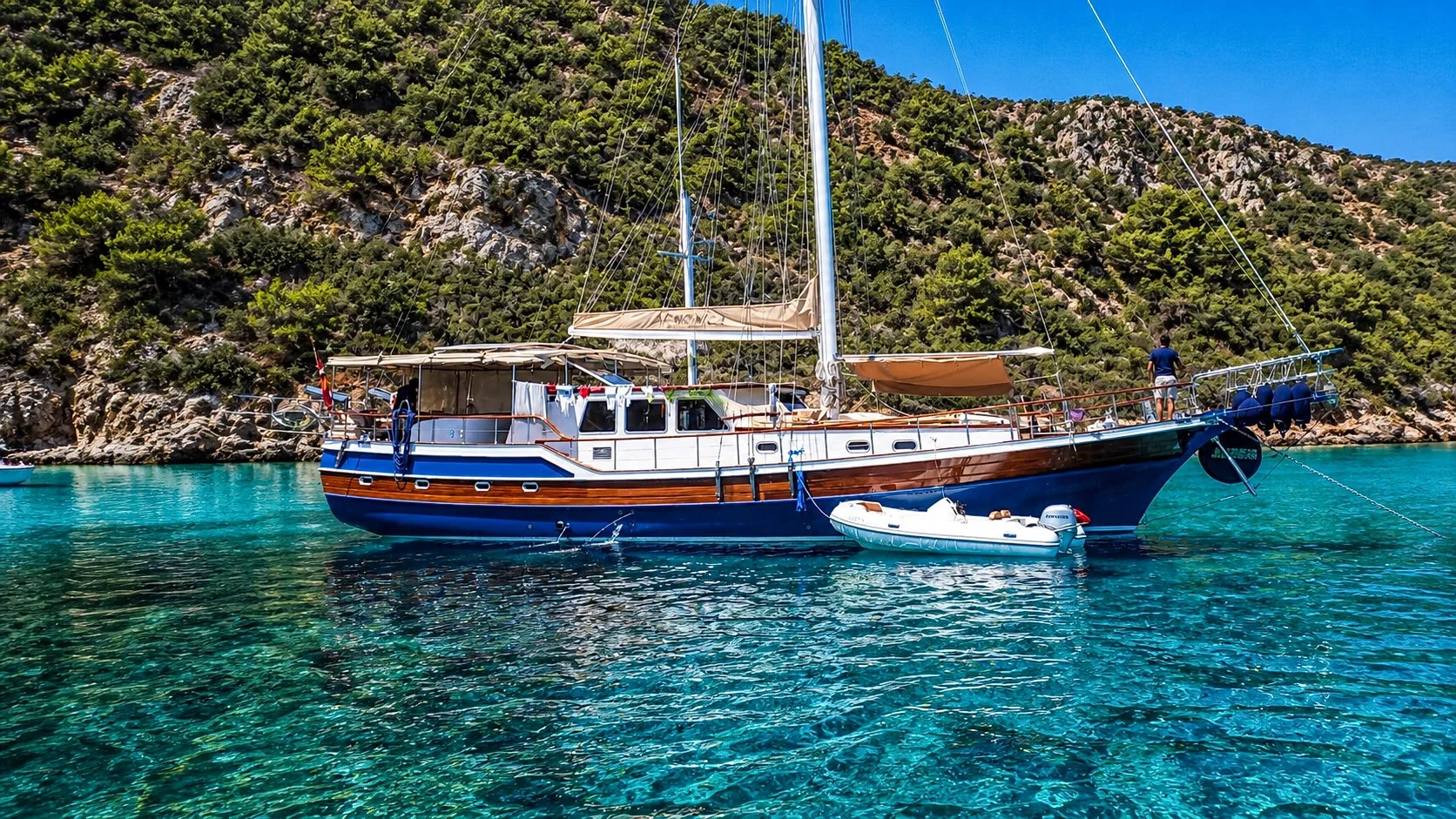 Private gulet anchored in clear blue water near Bodrum