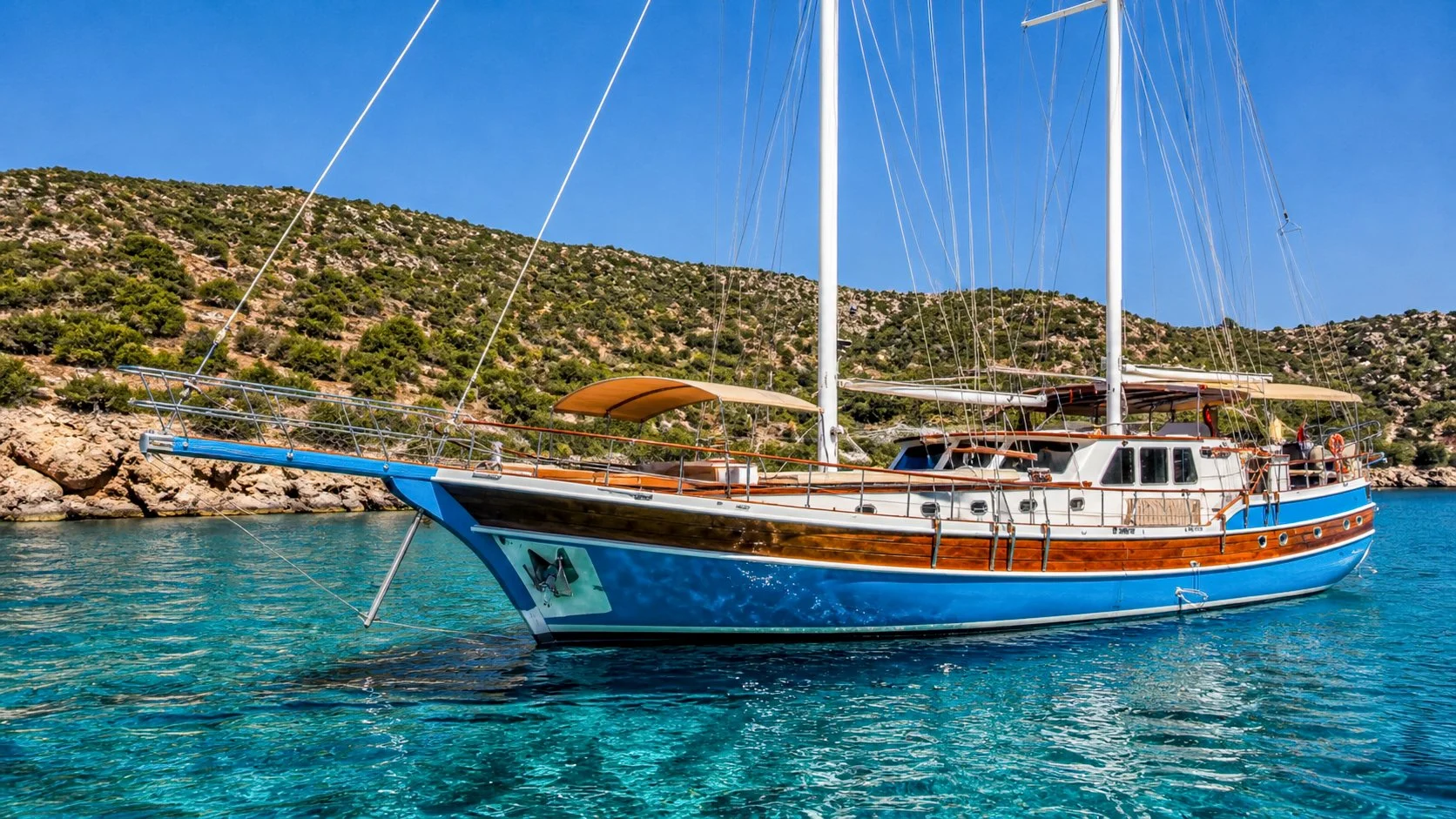 Private gulet anchored in clear blue water near Bodrum.