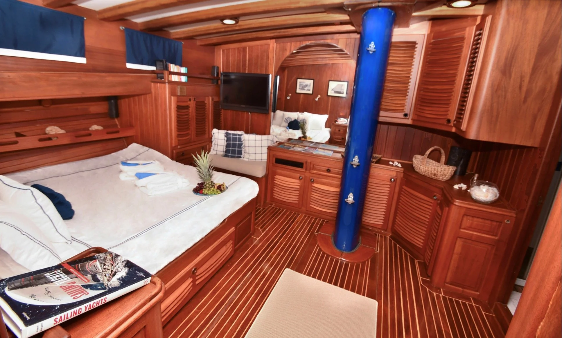 Wooden cabin bedroom inside a private gulet.