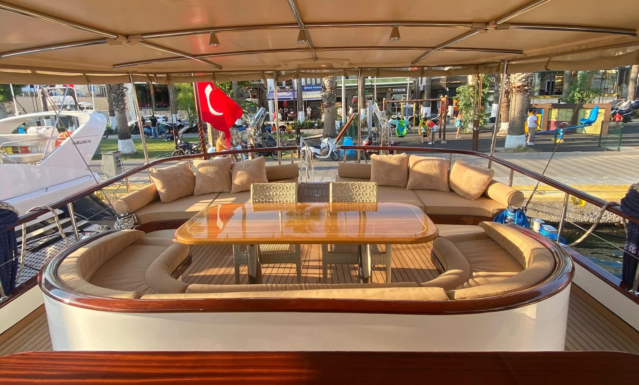 Private gulet deck lounge with marina view
