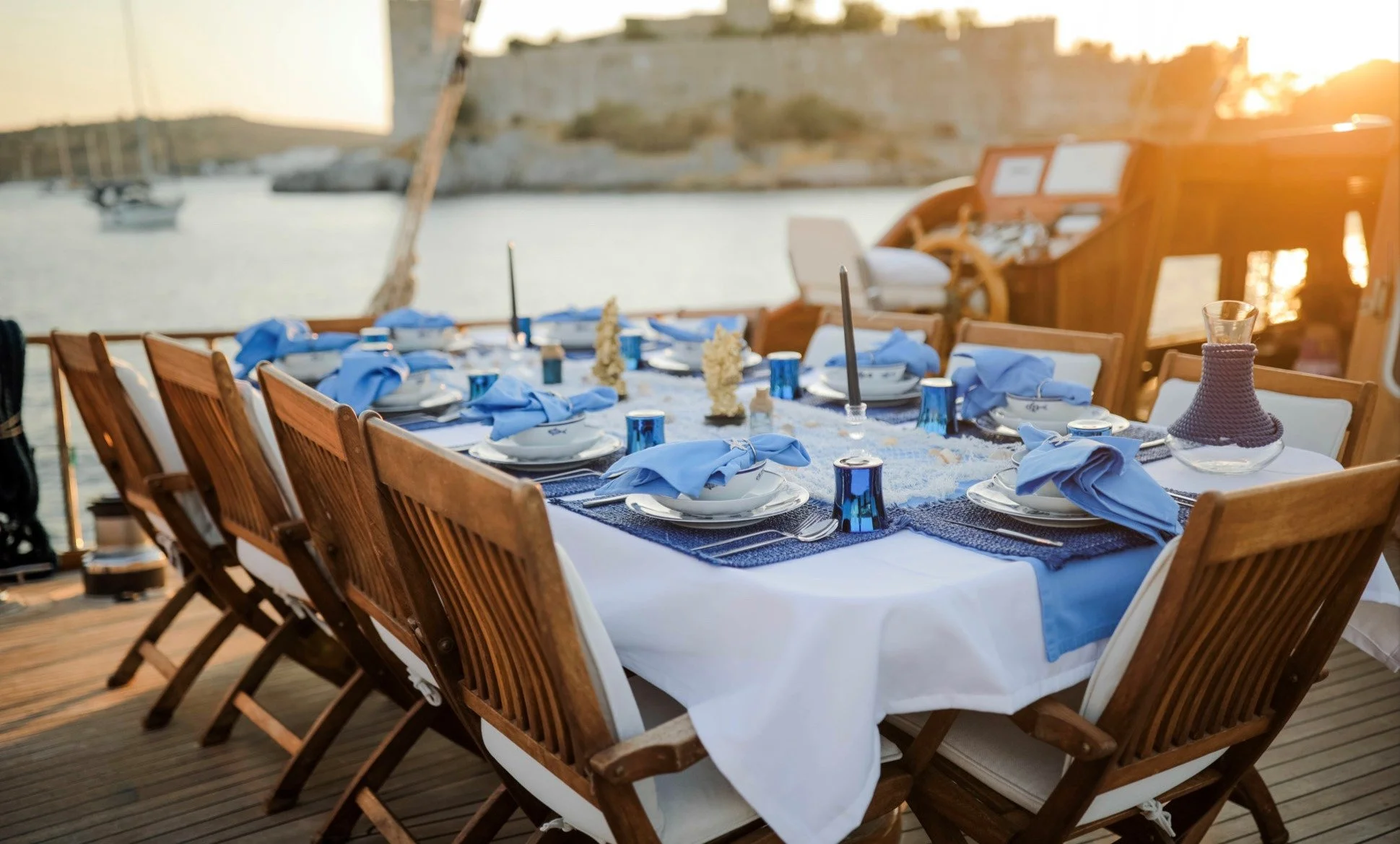 Sunset dining table setup on a private gulet.