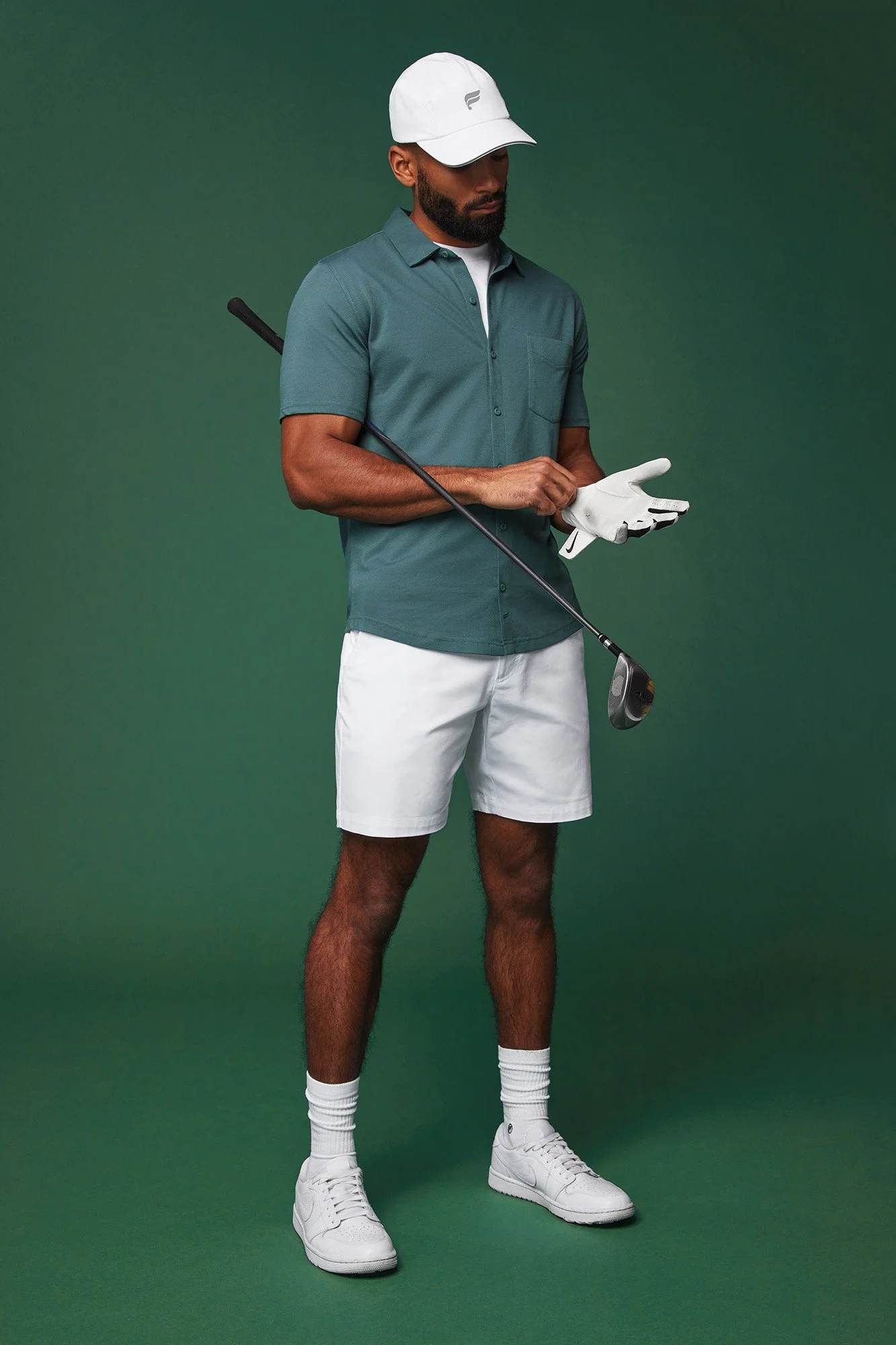 Golf apparel campaign art direction photographed in studio.