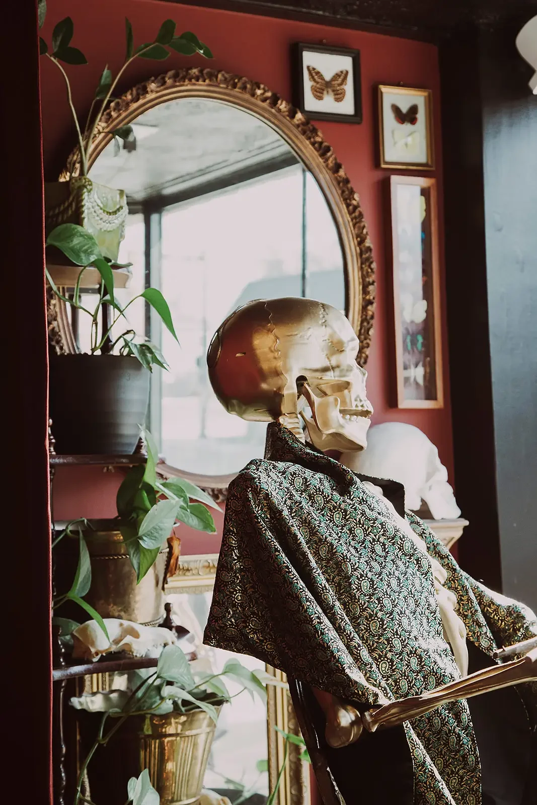 Gold skeleton and other decorative details at Nostalgia Tattoo in Brookland Park, RVA.