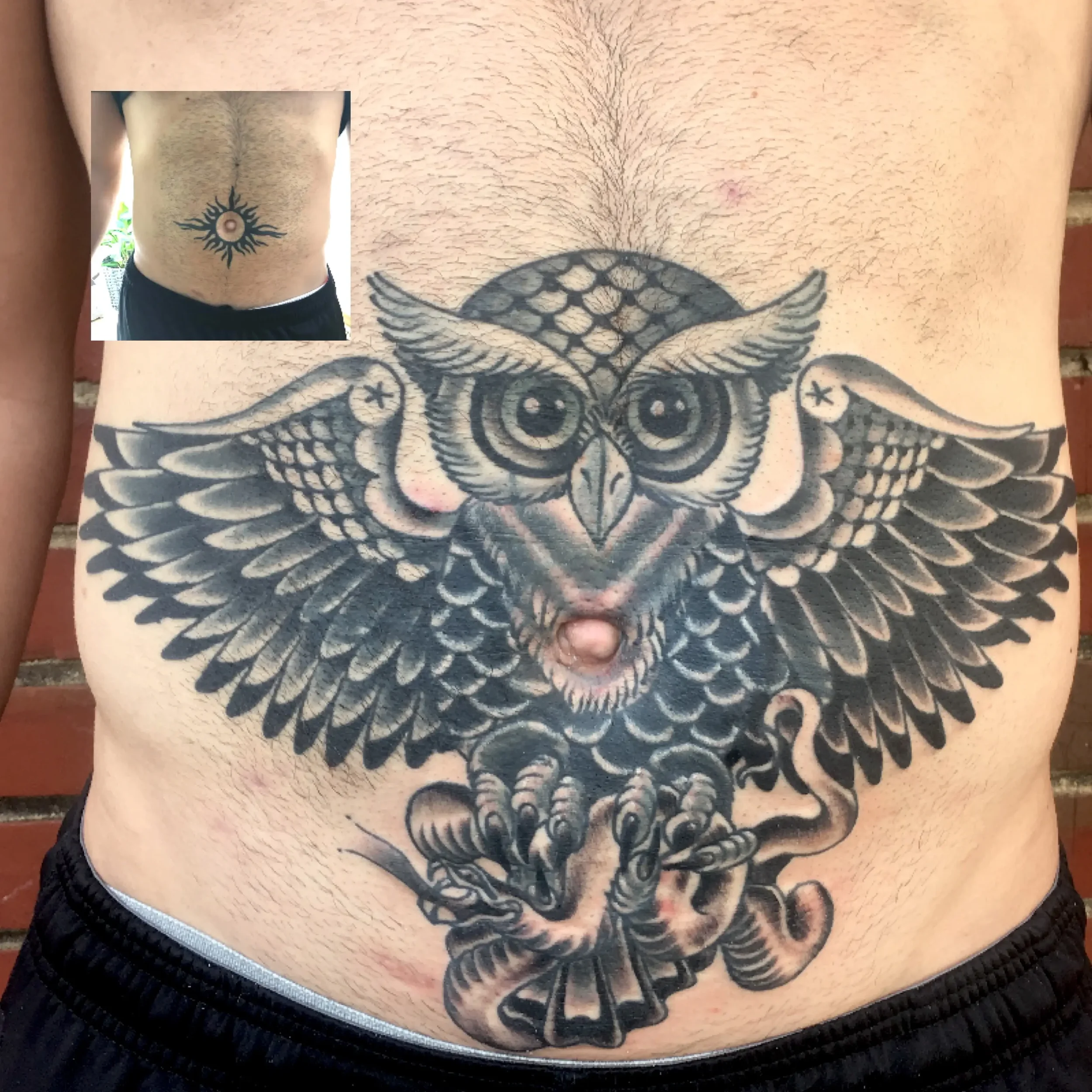 Coverup tattoo of an owl with wings spread wide across a person's abdomen. Custom design by Jess, tattoo artist in Richmond, Virginia.