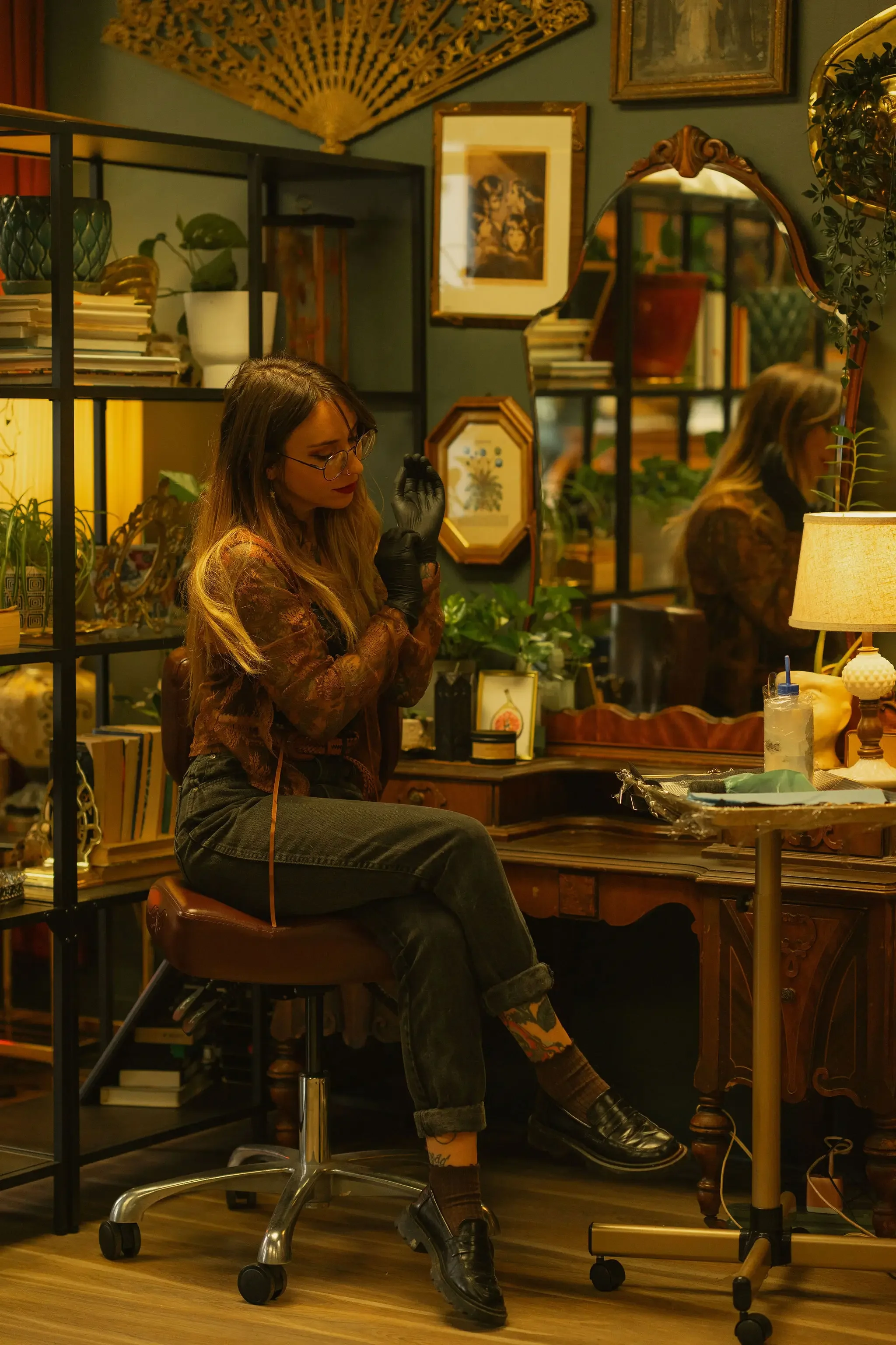 Dana, owner of Nostalgia Tattoo, prepping for custom tattoo in Brookland Park studio.