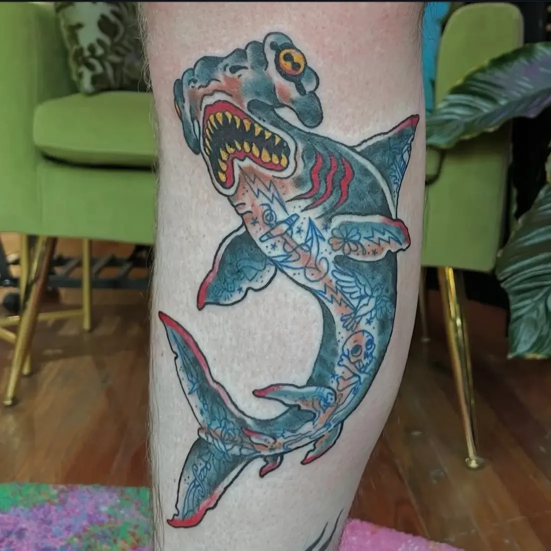 American Trad tattoo of a shark with symbols and patterns. Custom design by Jess, tattoo artist in Richmond, Virginia.