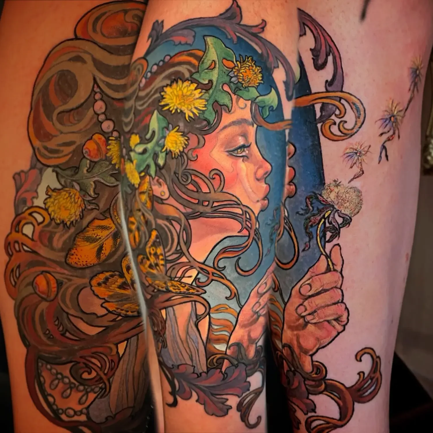 A colorful tattoo of a woman's profile with flowing hair adorned with dandelions and butterflies. She holds a dandelion in her hand, blowing seeds into the air. Custom Design by RVA tattoo artist Fronkie.