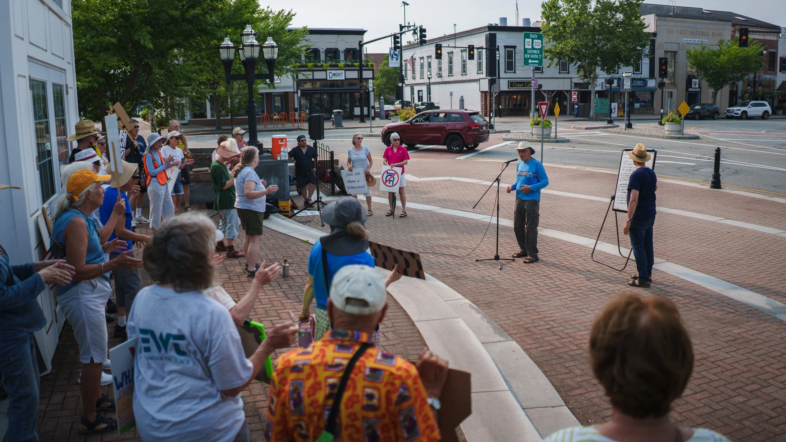 Participants of the July, 14 2026 No Kings protest in Westfield, Ma listen as a fellow member addresses the group. This day marks the 71st week of continued protest in Westfield against the current political administration.

(Photo by Steve Wolfinger