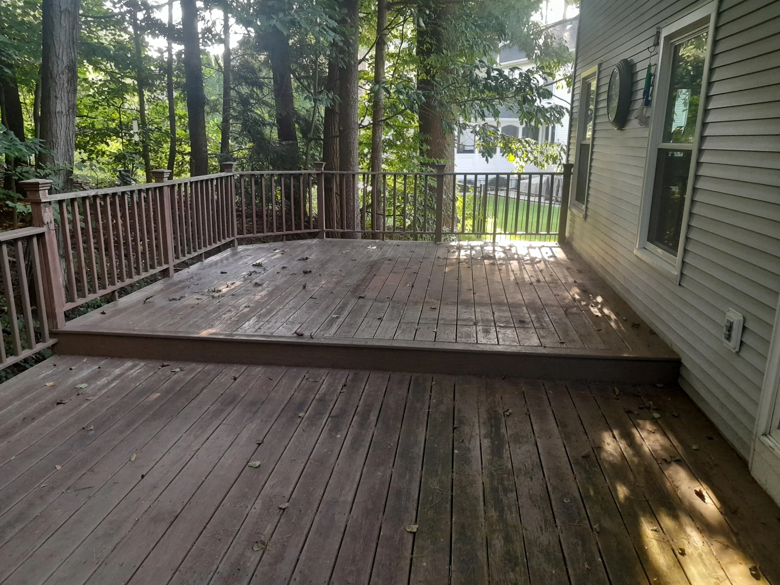Customers deck in Albany NY  that has been weathered and needed to be prepped and stained before it was too late.