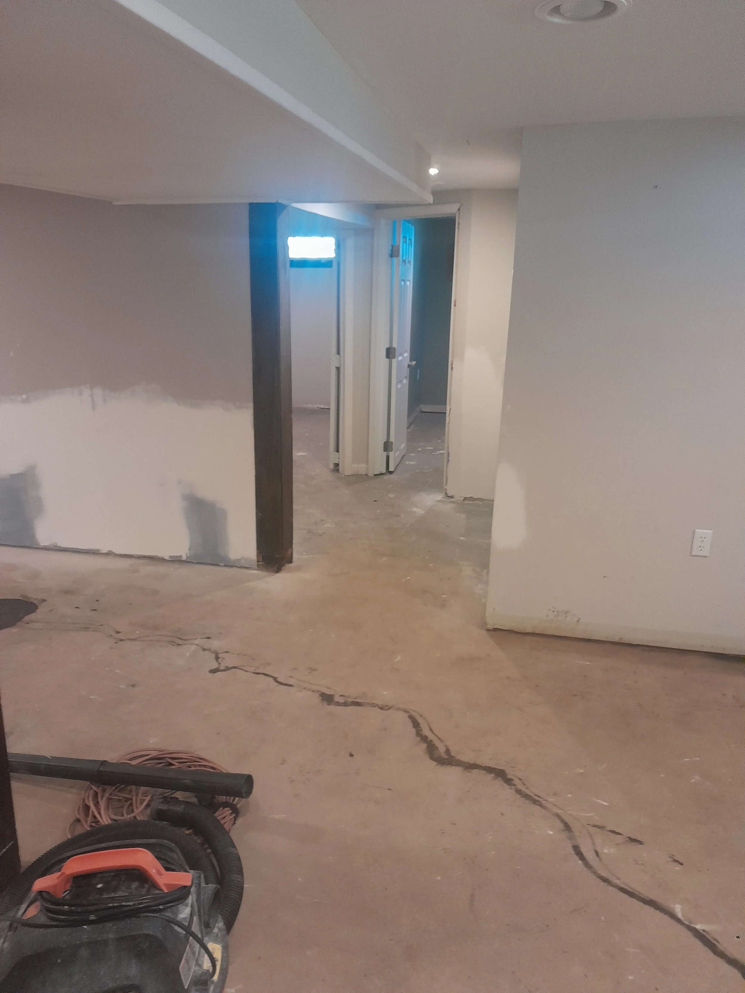 Prepping/ cleaning this basment concrete flooring prior to epoxy coating in Ballston Spa NY.