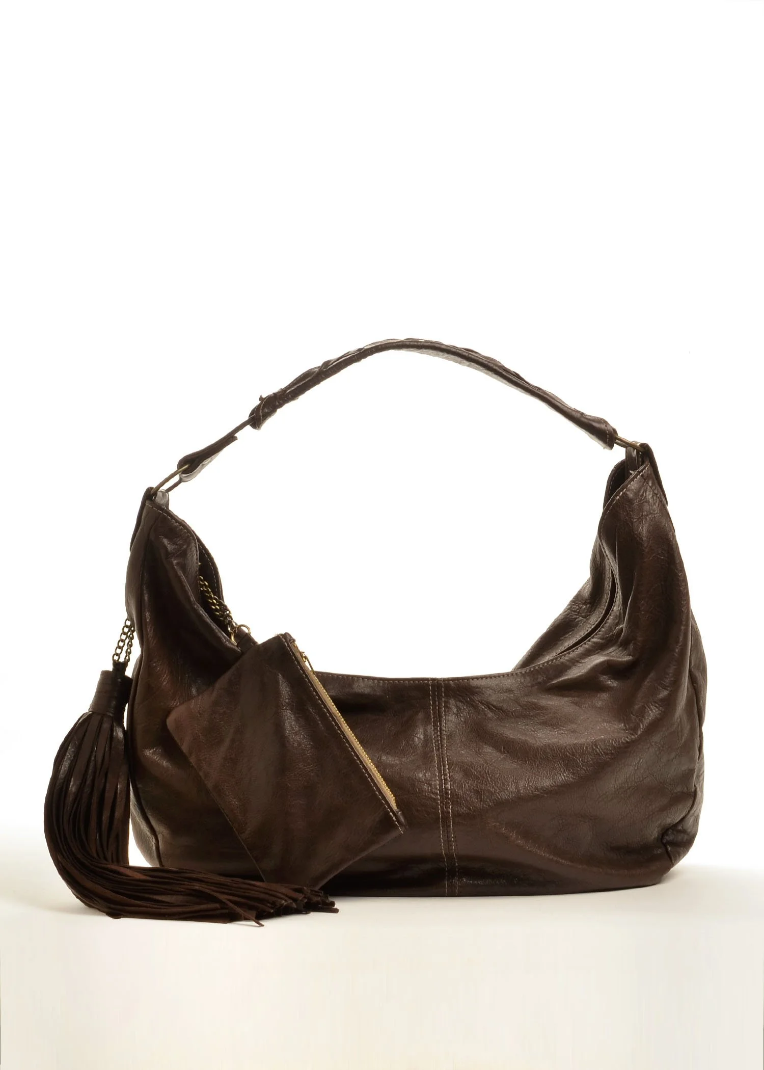 A brown leather handbag with a matching pouch and tassel details against a plain white background.