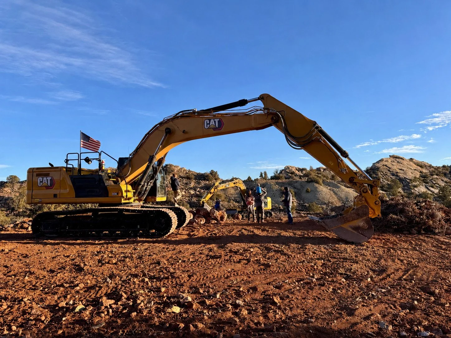 Artisan Group CAT excavator and crew at a large red-rock property in Southern Utah