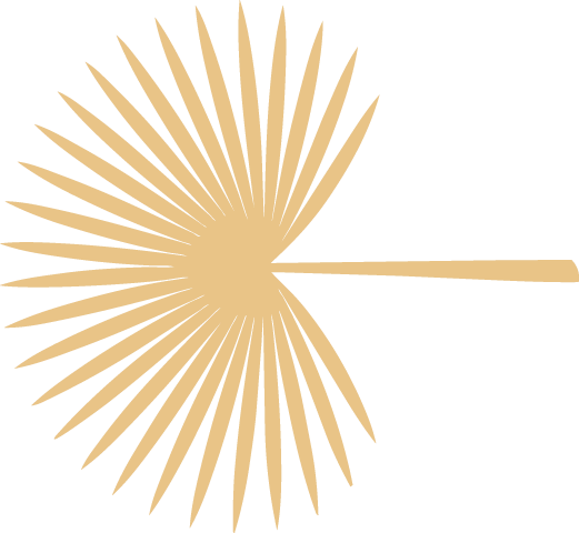 A gold-colored, spiky, palm leaf-shaped object with a handle on the right side.