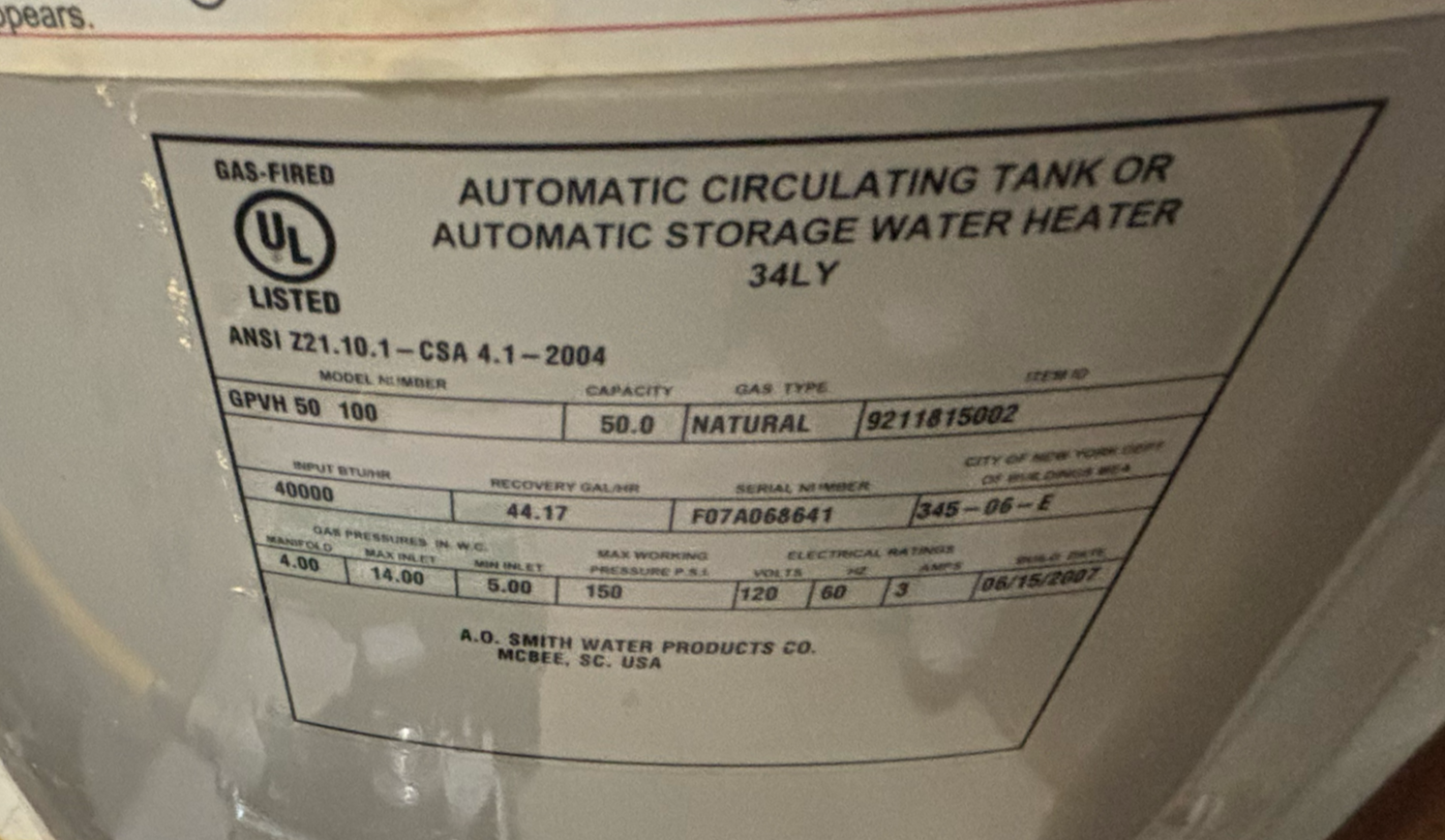 An image of a water heater manufacturer label and data plate attached to a gas-fired A.O. Smith ProMax unit.