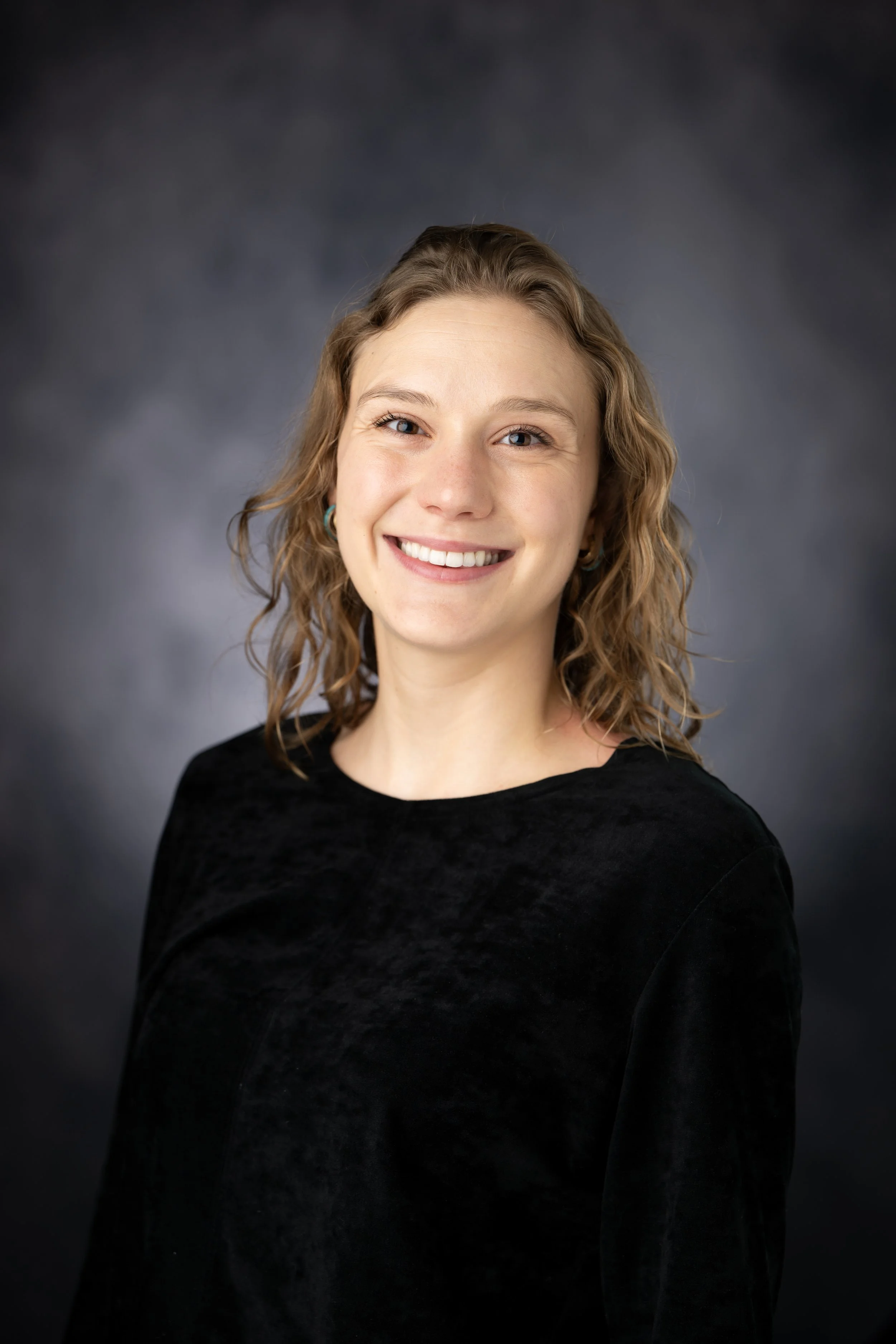 Portrait of Sarah Backstrand, policy researcher and advocate