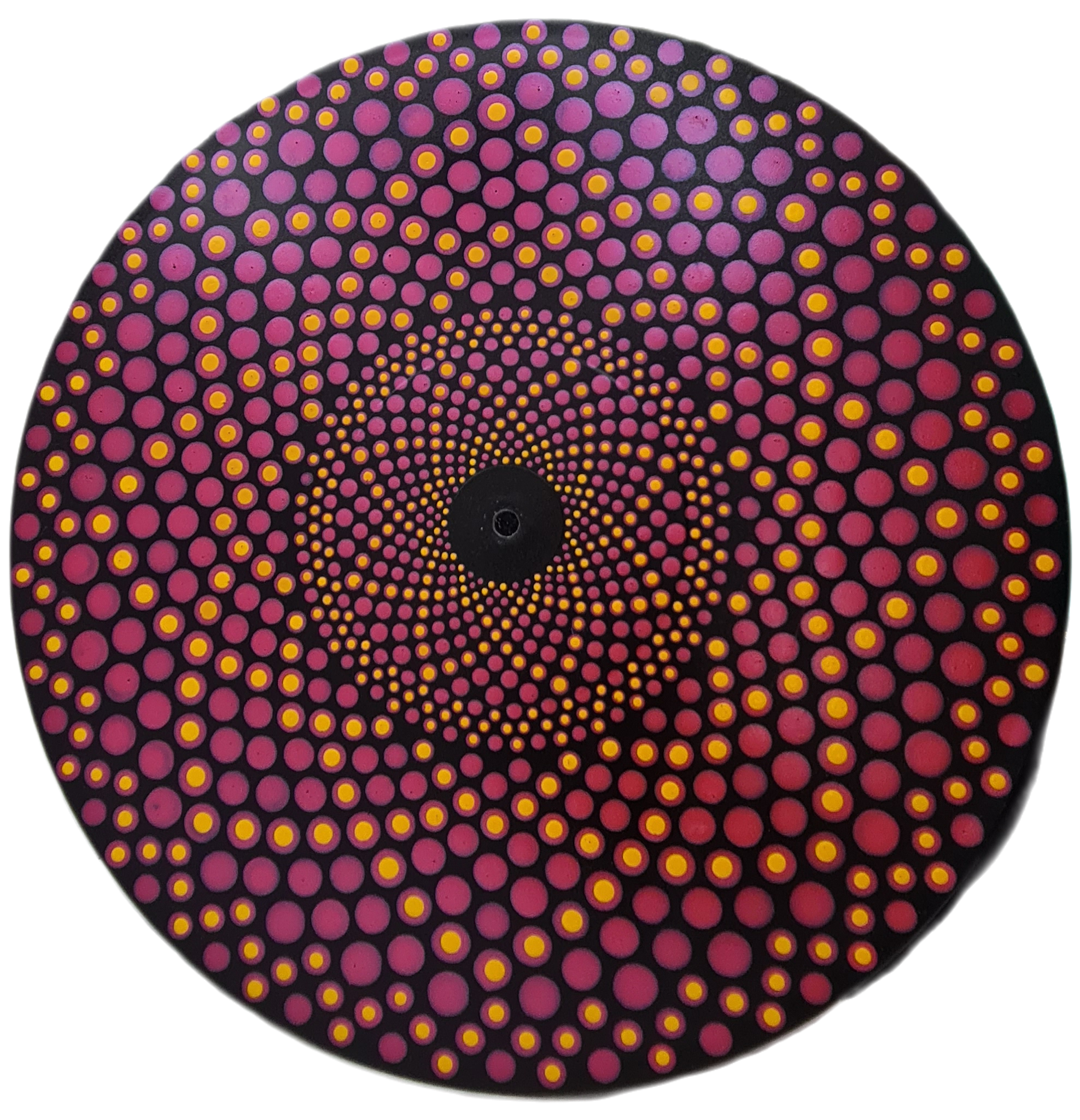 Close-up of a circular, colorful Aboriginal dot painting with pink, purple, and yellow dots forming a spiral pattern.