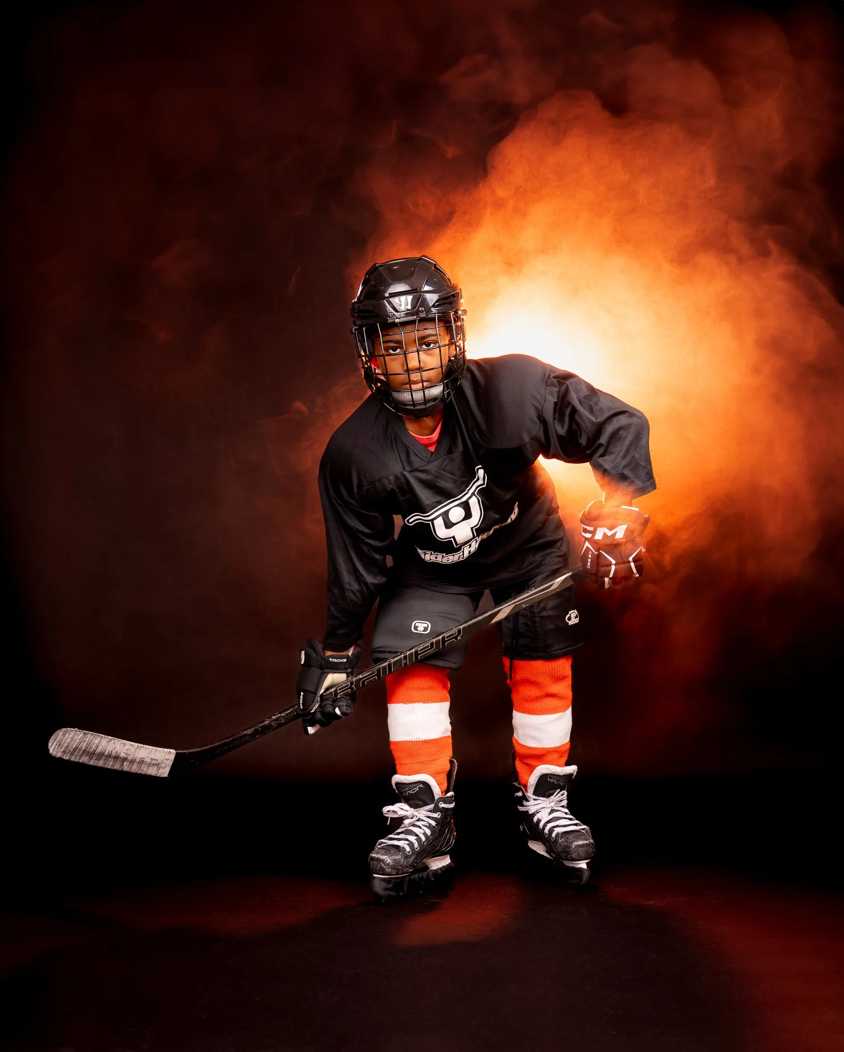 Youth sports portrait photography in Philadelphia featuring hockey player by Ran With A Cam