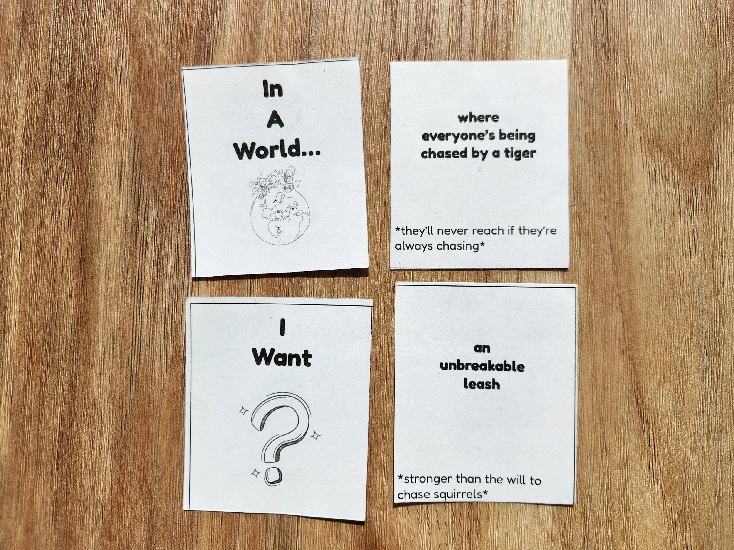 The original prototype of In A World, featuring black and white cards printed at home.