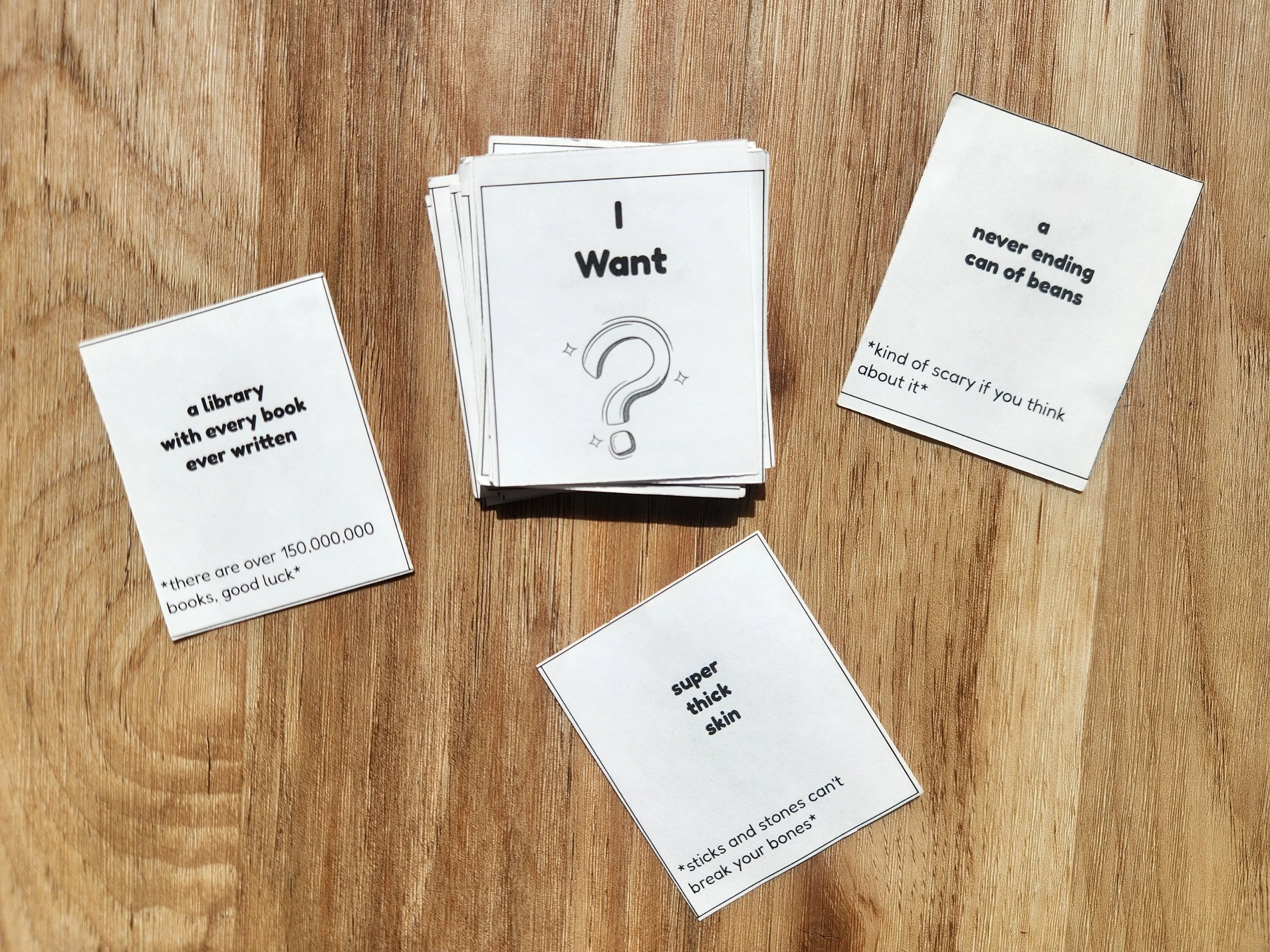 The original prototype of In A World, featuring black and white cards printed at home.