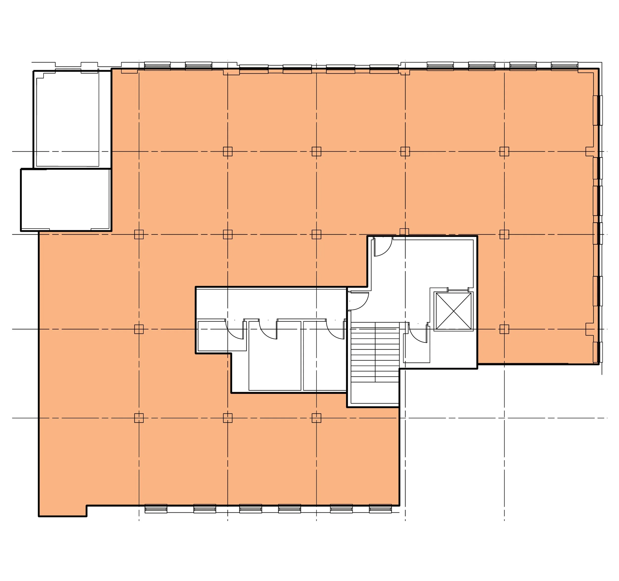 Floor plan of a building with an open large orange-colored area and a smaller white area with rooms, stairs, and elevator.