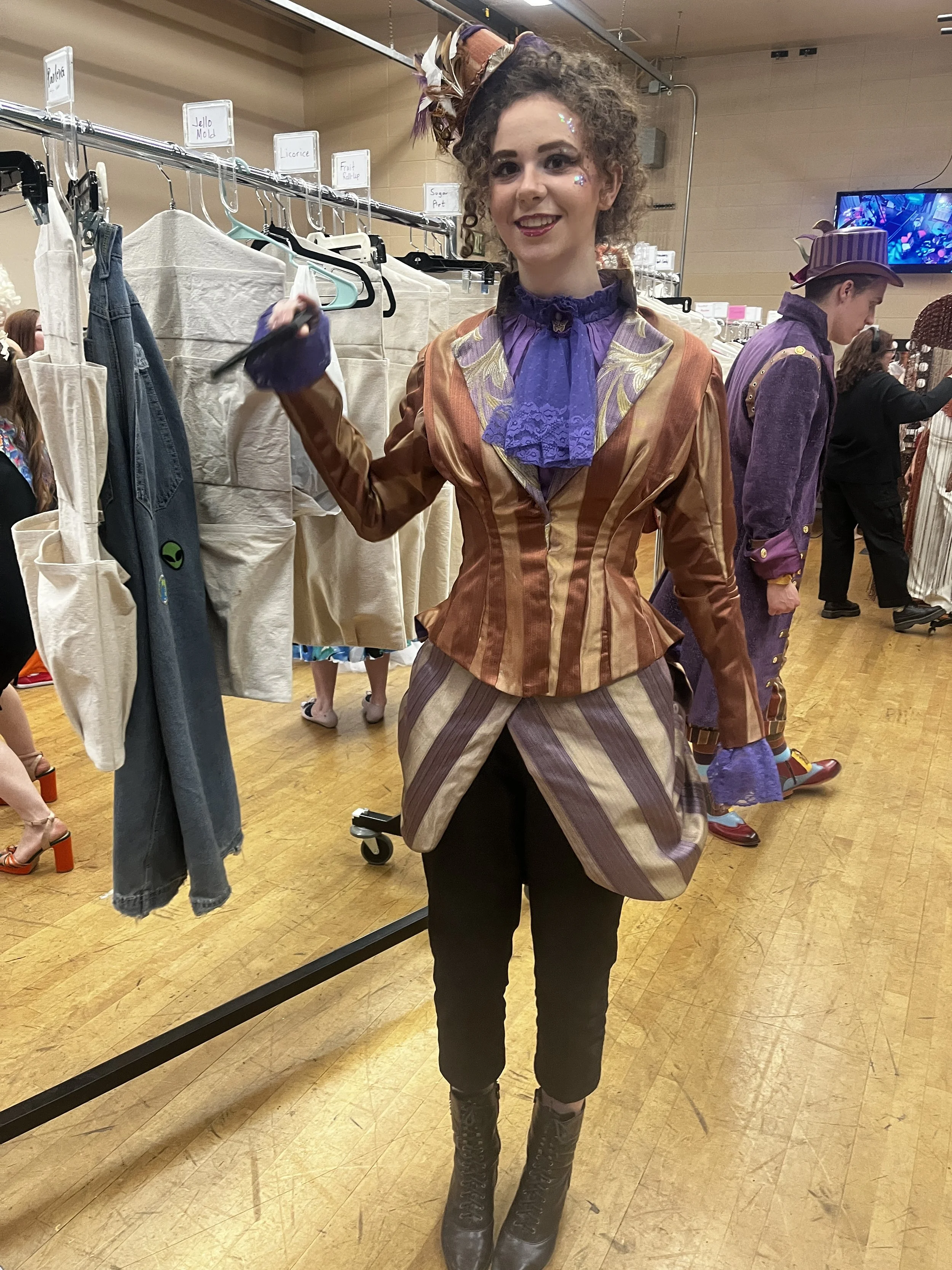1880s jacket, bustle, swag, corset, dickie, jabot, and hat. Patterns were based on 1880s sewing patterns. 
