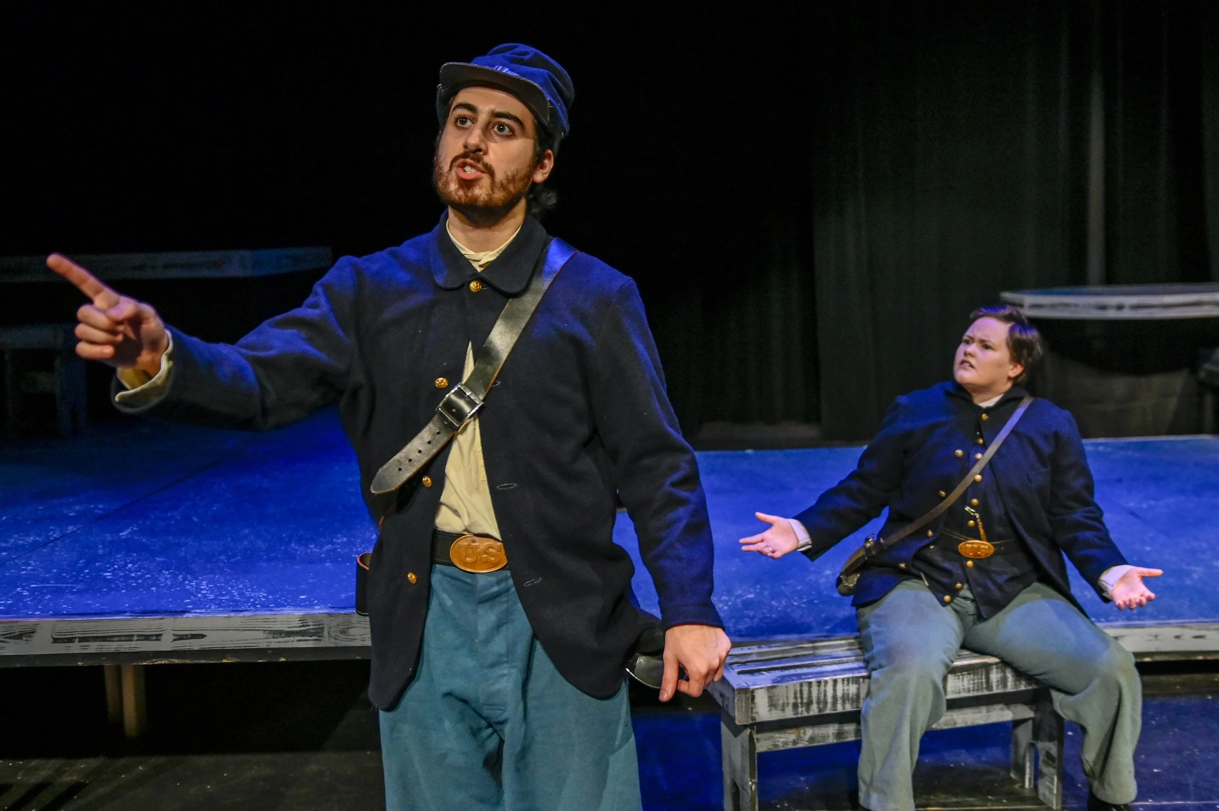 Karam Alkhatib as Iago as Erikah Potter looks on confused