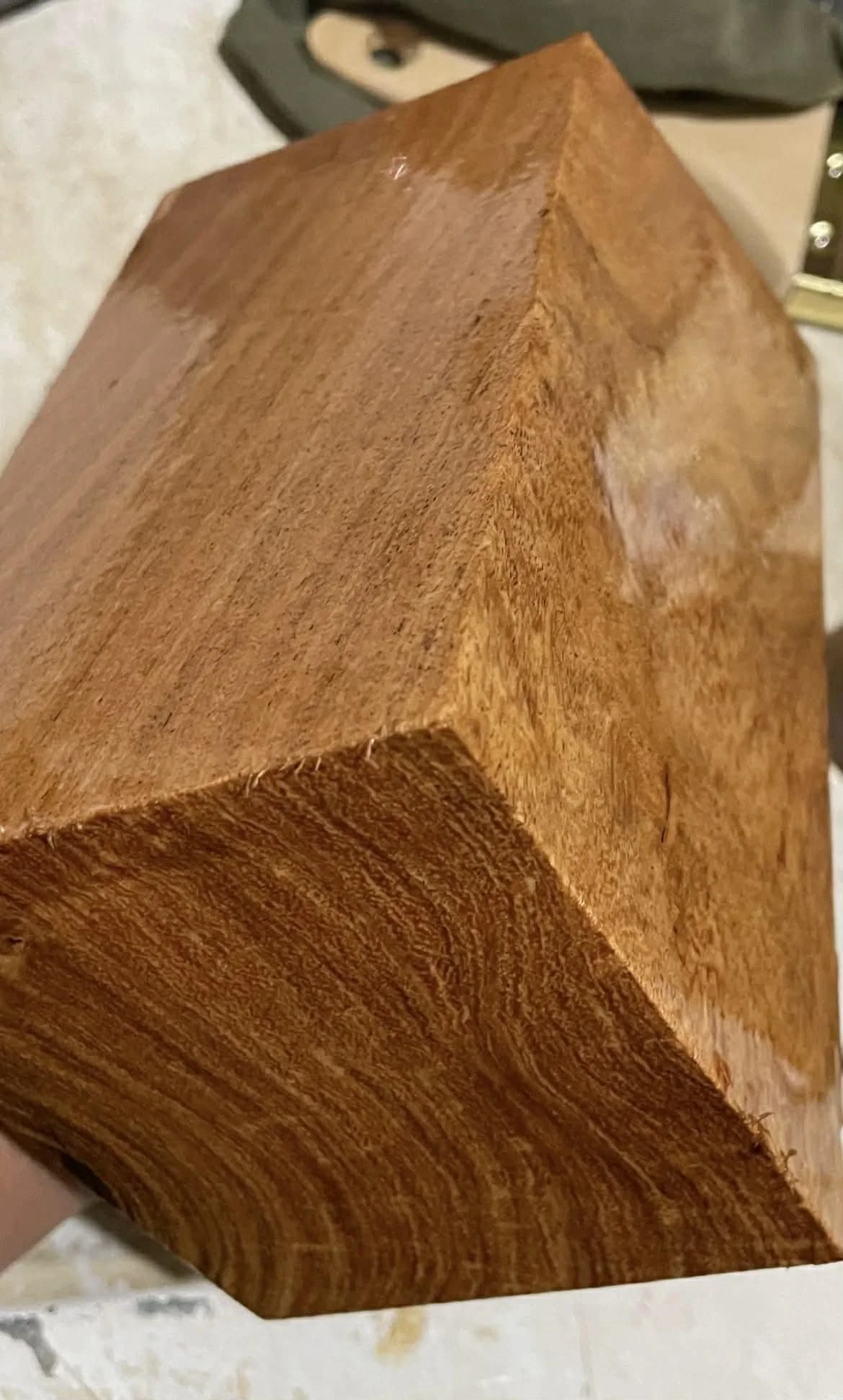 Close-up of a wooden block showing the wood grain and texture.