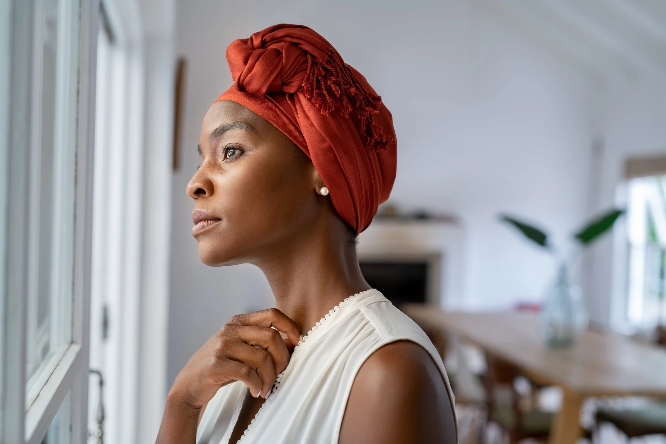 iStock_Blackwomanlookingoutpic.jpg