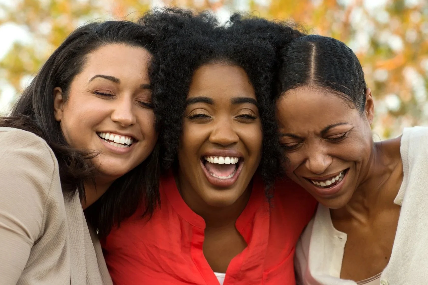 3womenlaughgrpcoachpic.jpg