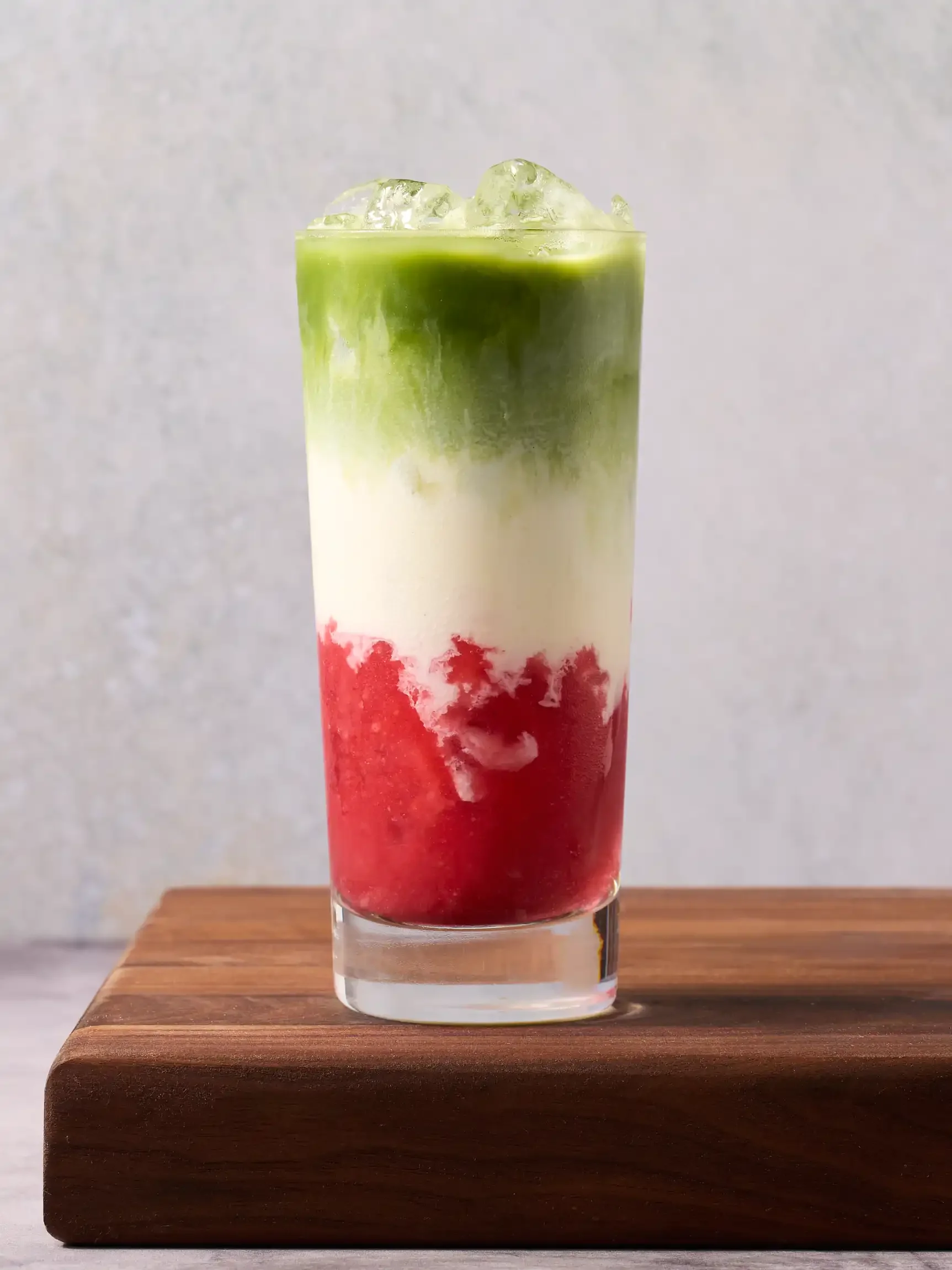 Iced Matcha Latte With Raspberry Syrup photographed by drink photographer Paul Bartholomew. Bucks County, PA & Philadelphia & New Jersey region.