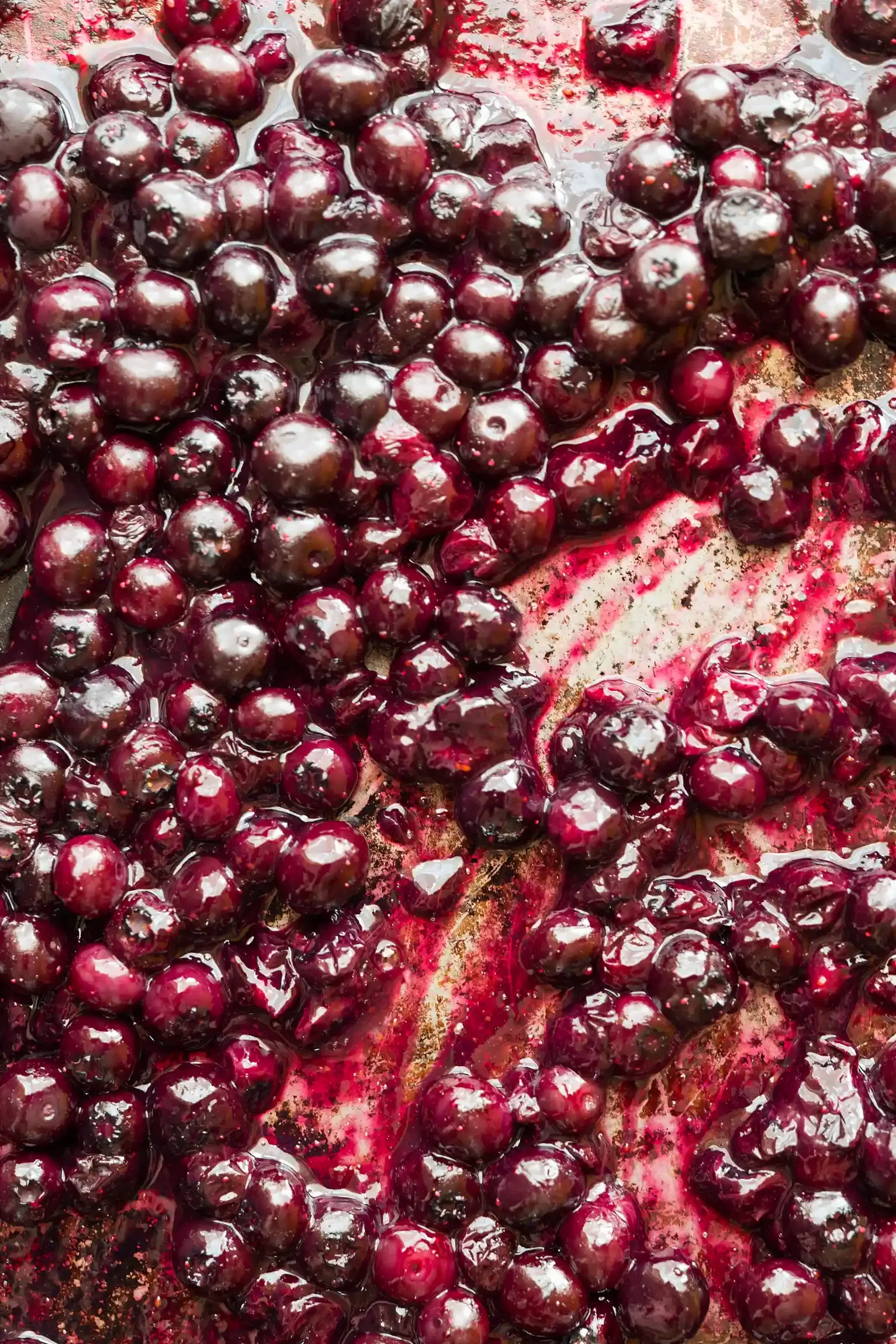 Close-up of fresh blueberry jam. By Philadelphia, PA & NJ food photographer & food stylist team Bartholomew Studio.