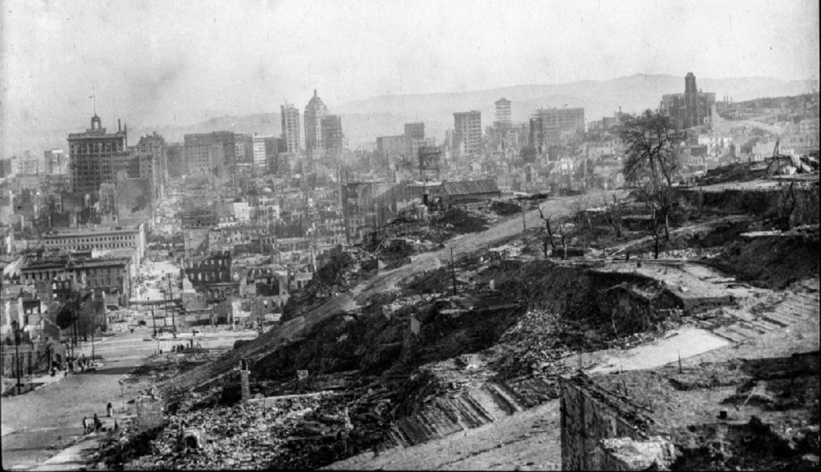 View south along Montgomery Street after the earthquake and fire of 1906. Today's Vallejo Steps Garden sits on the steeply inclined road at the center of this photograph.