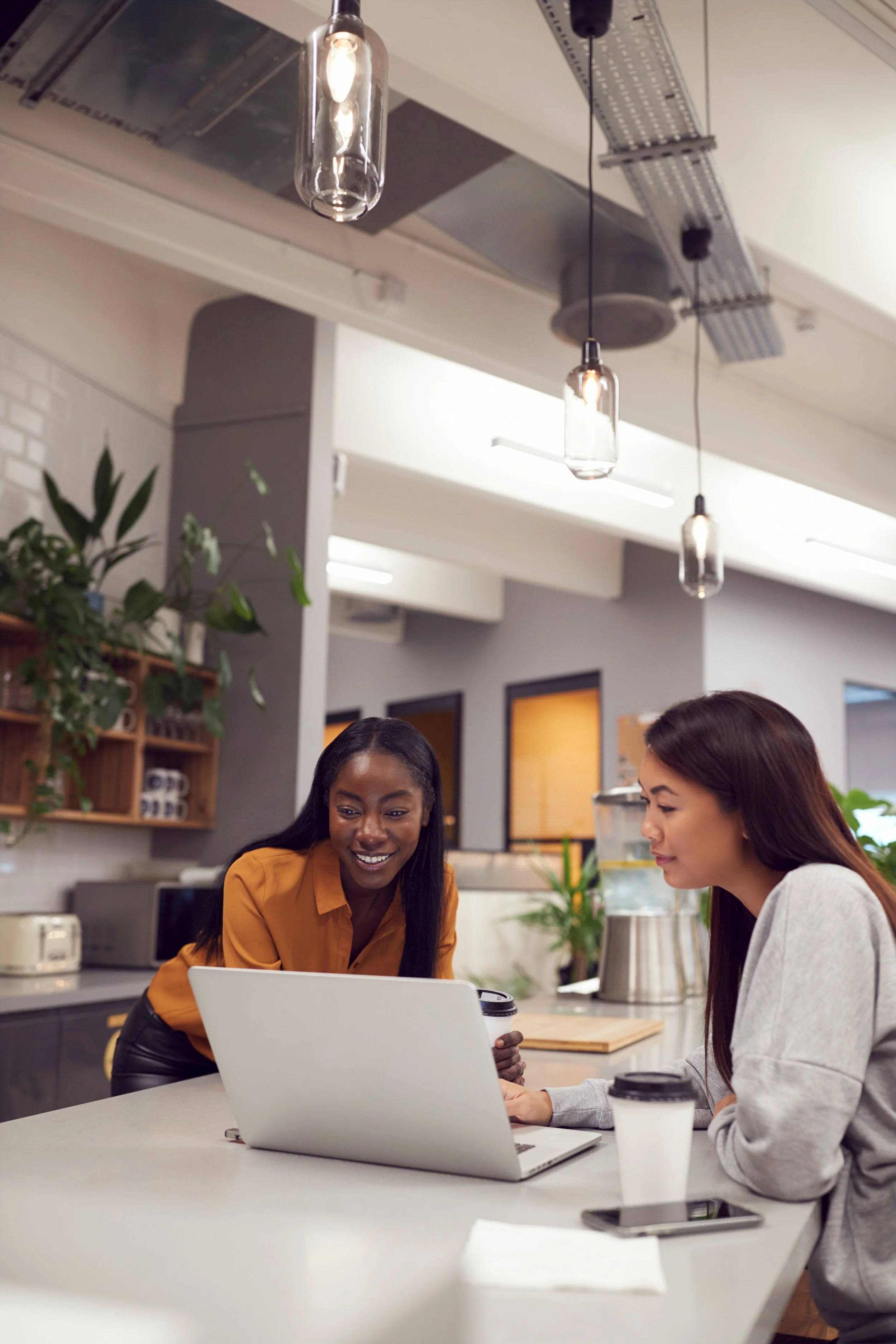 Planned and scheduled social media posts with branded graphics on a content calendar