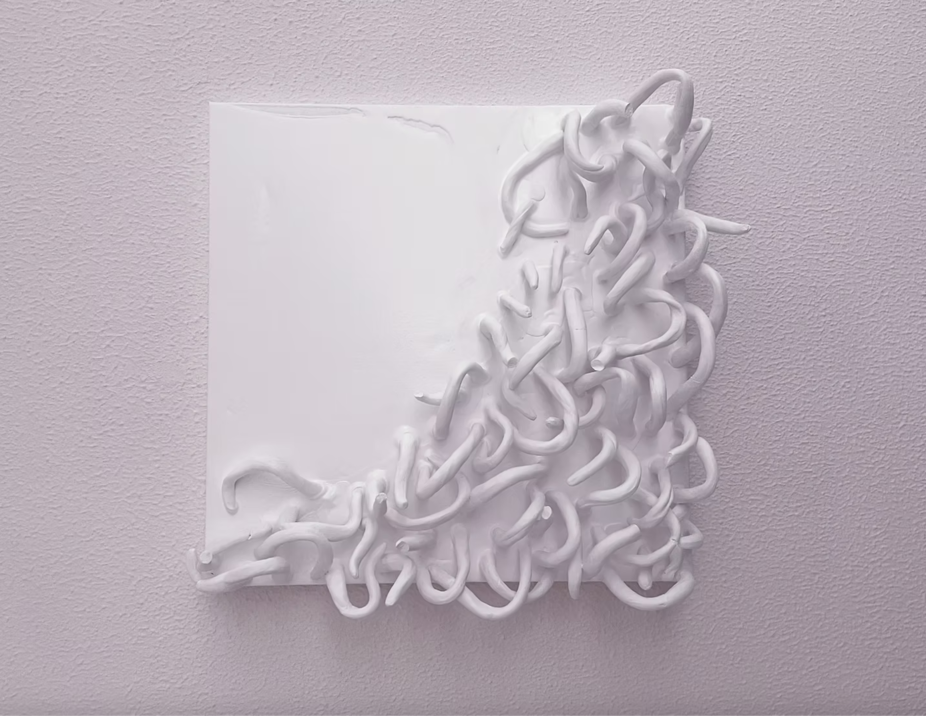 Impositions in White, 2025. Clay and gesso pour on canvas.