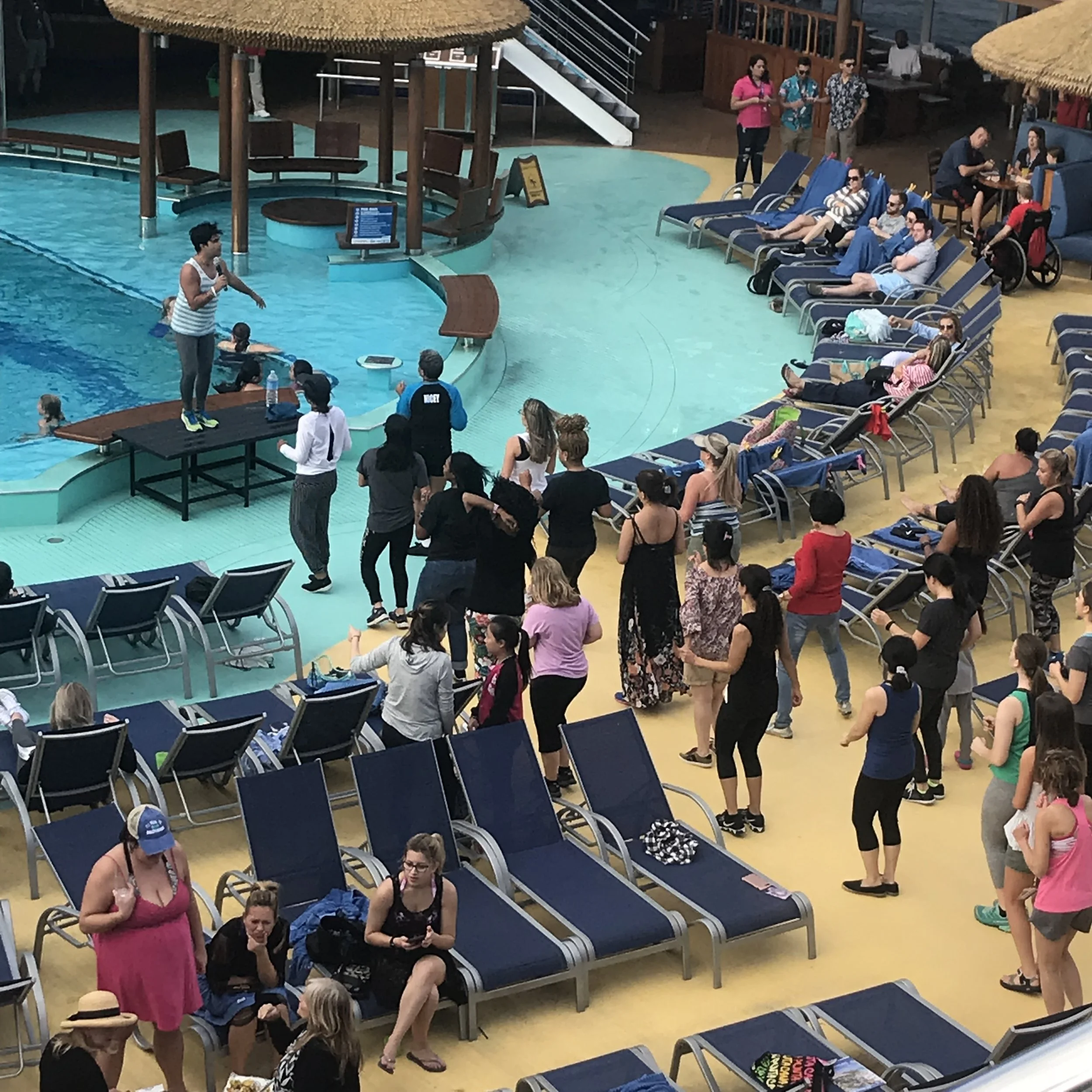 large-cruise-ship-pool-deck-busy-atmosphere