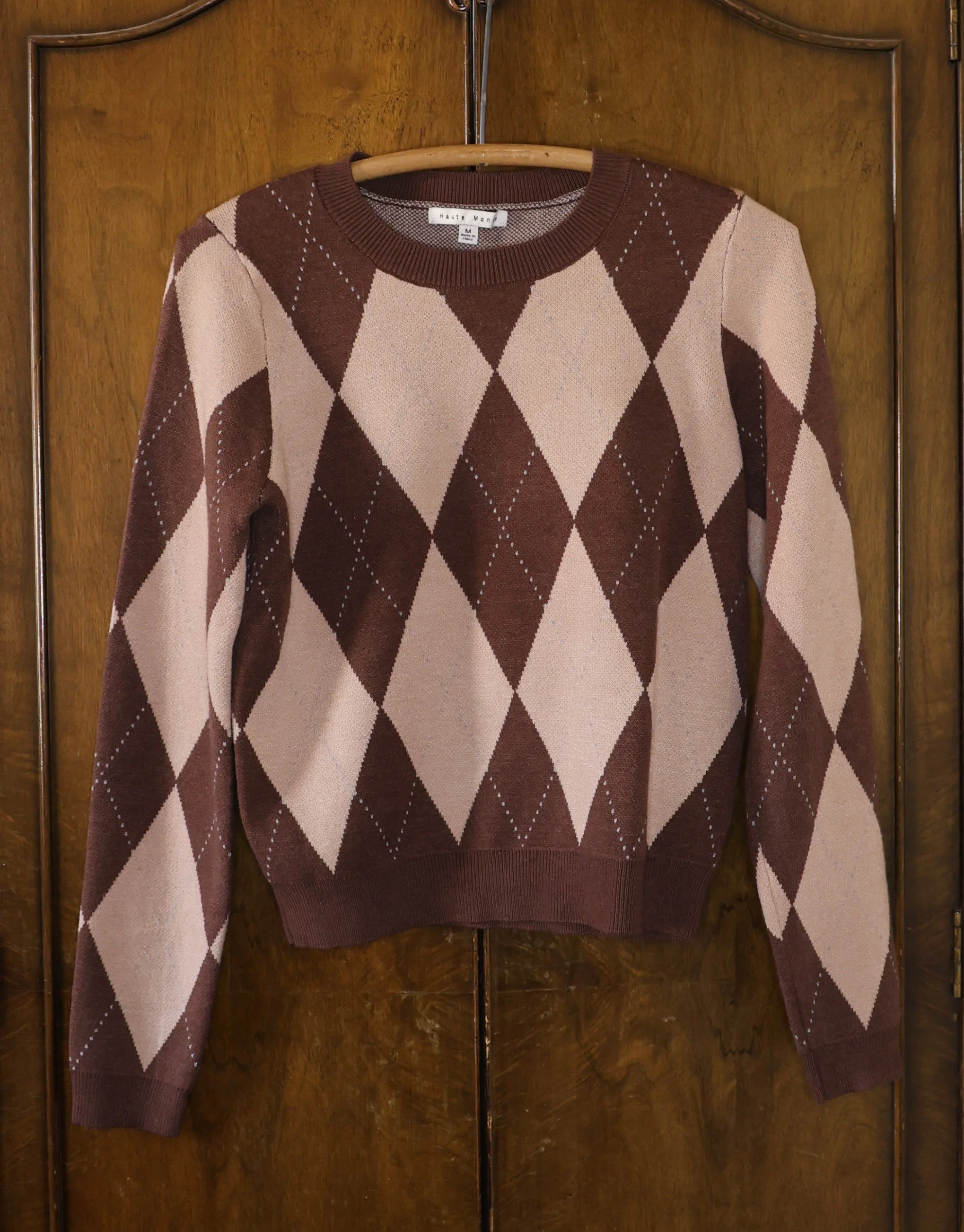 Argyle sweater in brown, tan and light blue. Size medium. Excellent Condition