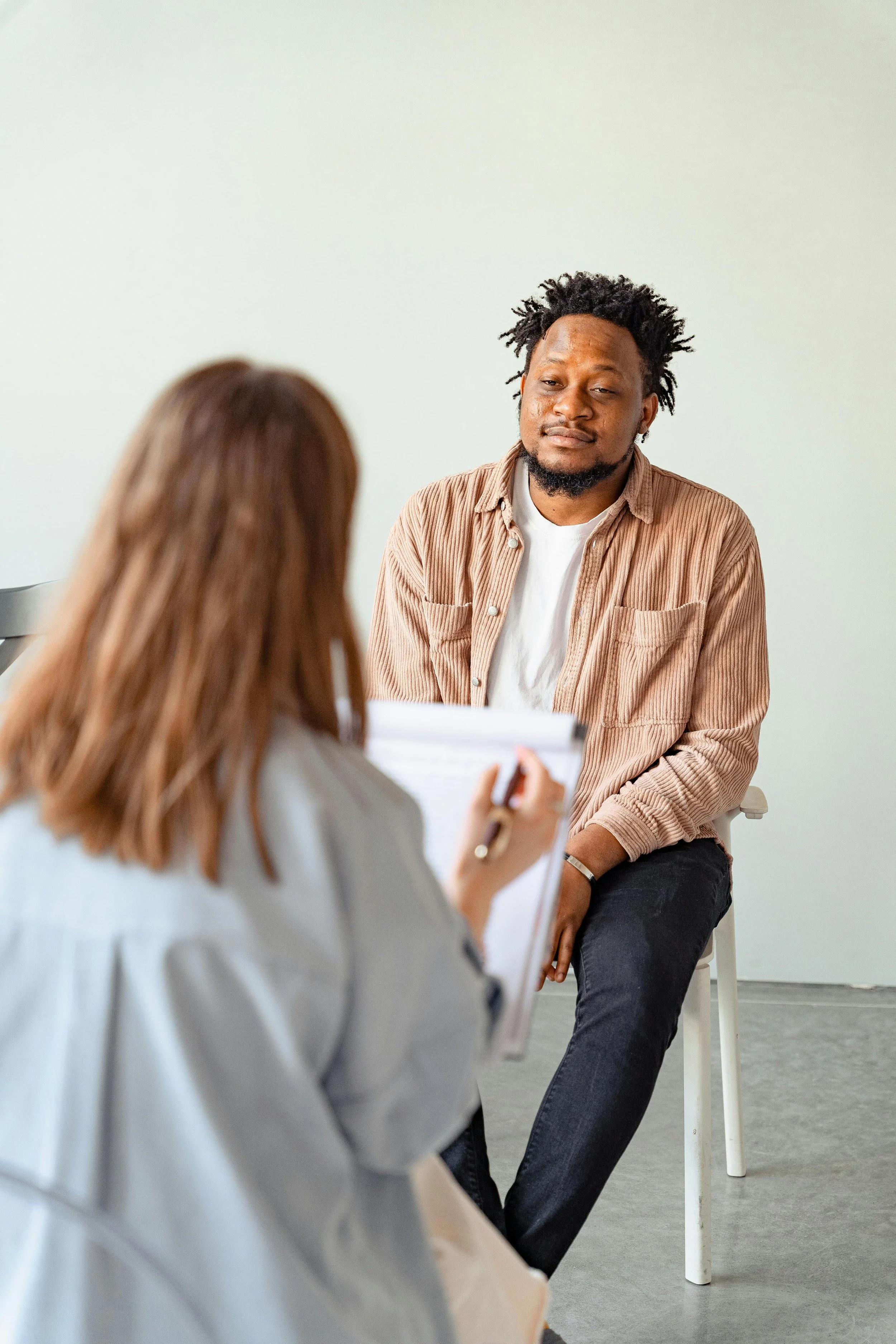 Man participating in an ADHD and autism comprehensive evaluation.